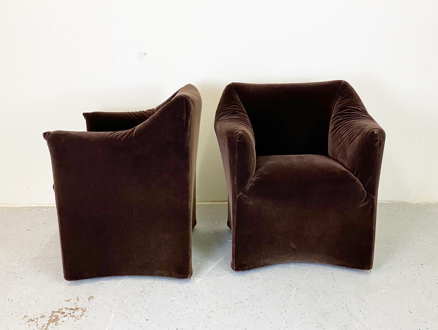 An expertly restored pair of Tentazione chairs by Mario Bellini for Cassina. These have been beautifully upholstered in a plush mohair. These are extremely comfortable and elegant.