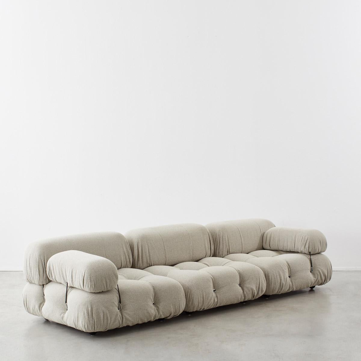This modular sofa was designed by Mario Bellini in 1971 and was manufactured by C&B Italia. The backs and armrests are provided with rings and carabineers, which allows the user to create the desired configuration best suited to their needs. The