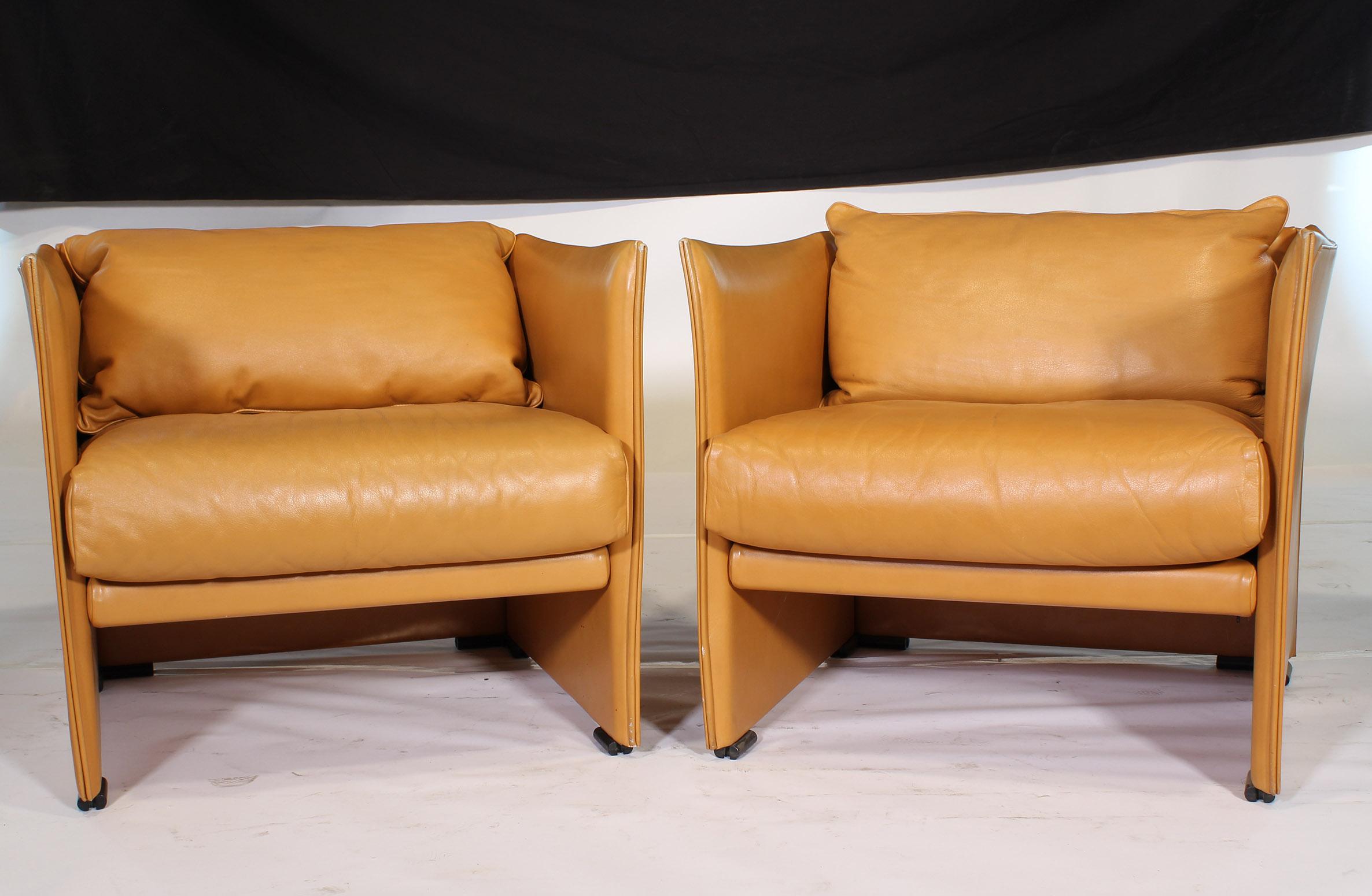 Authentic vintage set of 4 Mid-Century Modern Armchairs by Mario Bellini in light brown leather. We currently have the matching sofa available. This listing is for the four armchairs only.