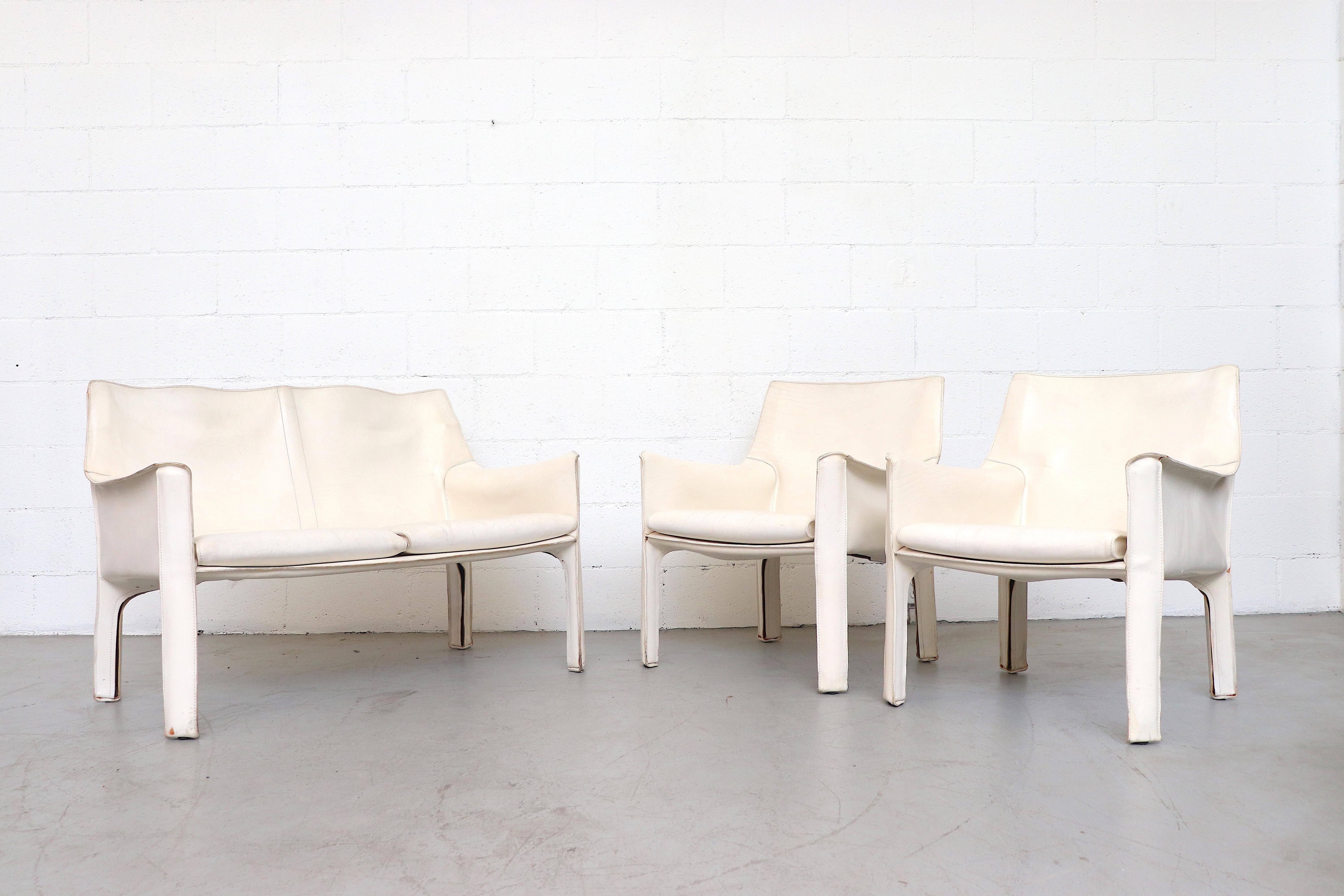 Mario Bellini White Leather cab love seat for cassina. In original condition with very visible signs of wear consistent with its age and usage.