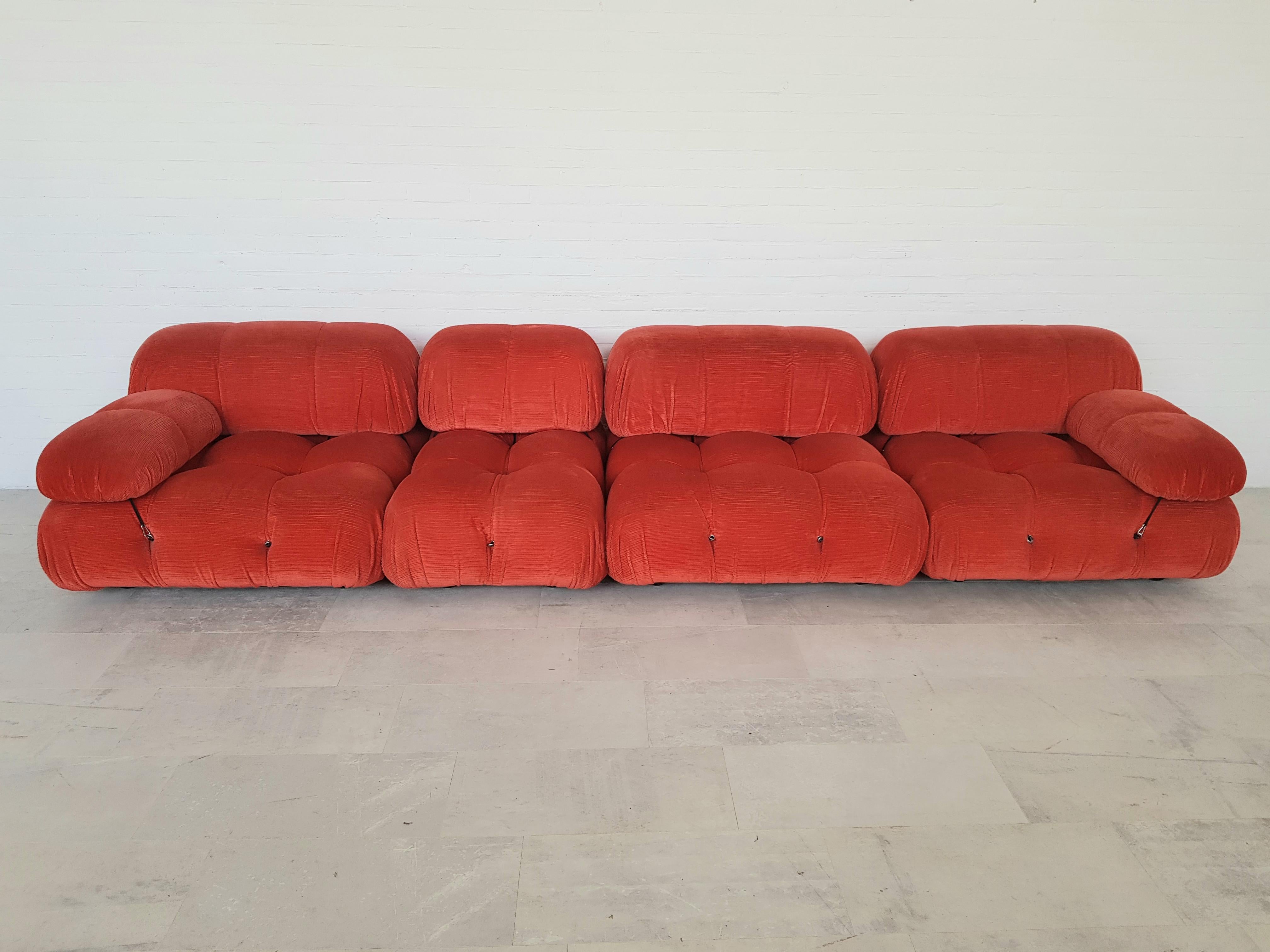 Camaleonda sectional sofa by Mario Bellini for C&B Italia 1971

Postmodern sectional sofa by Mario Bellini for C&B Italia in the 1970s. The entire sofa consists of 3 big seating elements, one ottoman and two armrests. 
As we have a large stock of