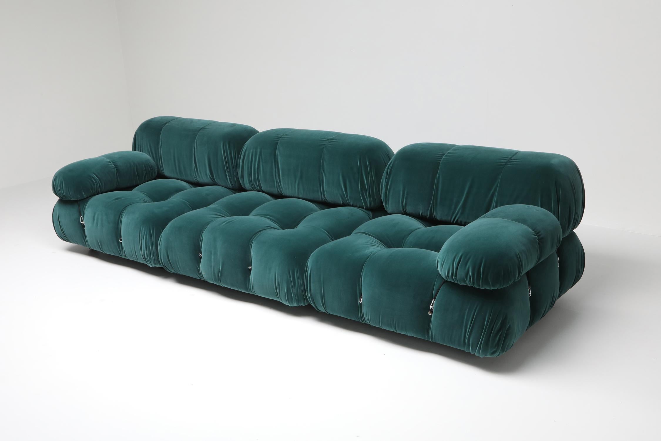 Post-modern modular couch by Mario Bellini for B&B Italia in the 1970s. 

The entire sofa consists of 3 big seating elements and two armrests. The couch has been reupholstered in a petrol green velvet fabric. 
We can assemble your dream sofa and