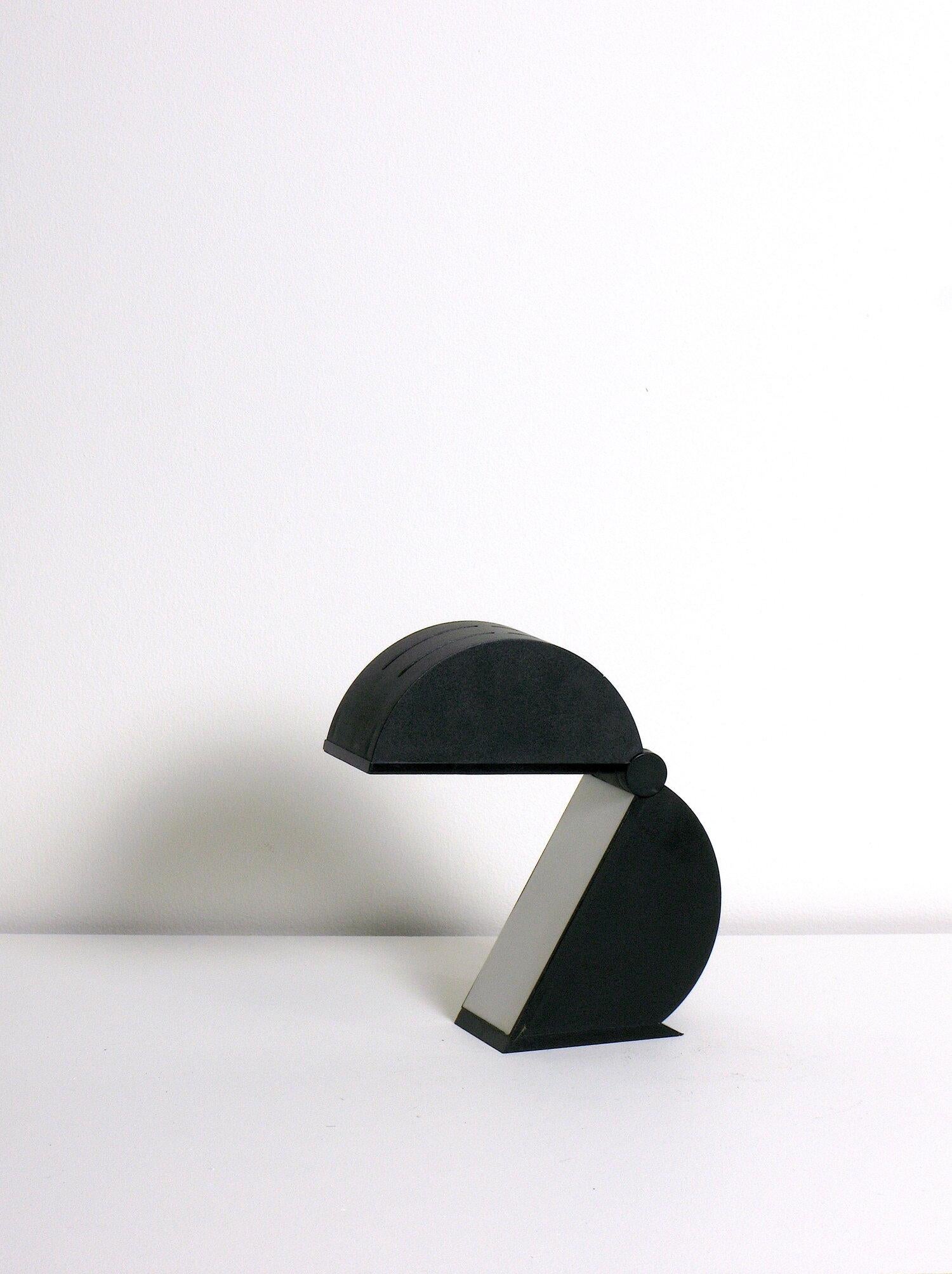 Iconic Mario Bertorelle Disco lamp for JMRDM Massanzago. Adjustable molded plastic disc. 15-25 watt E-14 (European bulb) or higher if LED/CFL.

Tested original E-14 bulb European socket, cord, on/off switch, and grounded north American plug. Minor
