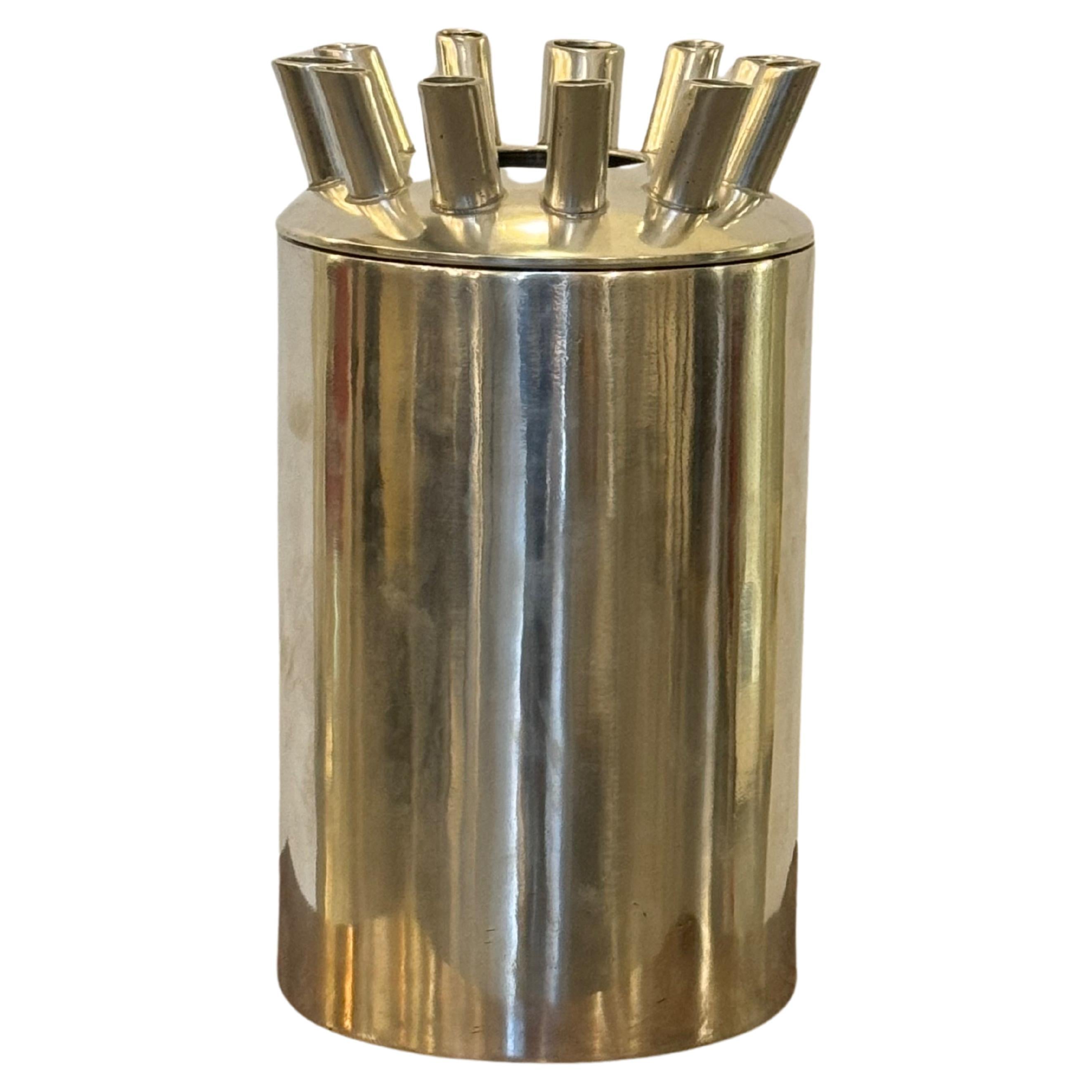 Streamlined Modernist polished Pewter sculptural vase by Mario Botta for Numa.
Artist Proof Prototype, signed by both artist and manufacturer.
This vase is a prototype of vases as featured on the 'Tredici Vasi' (13 Vases) collection.
The 'Tredici