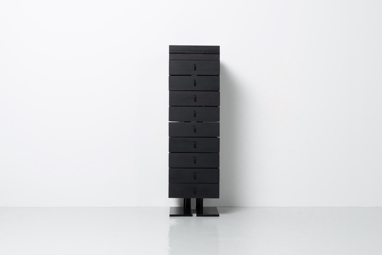 Beautiful and minimalist Robot drawer cabinet by Architect and Designer Mario Botta, by Elias Italy 1989. The furniture that comes from the hand of the Swiss Architect could be seen as form studies or scale models, in which the mind of Botta played