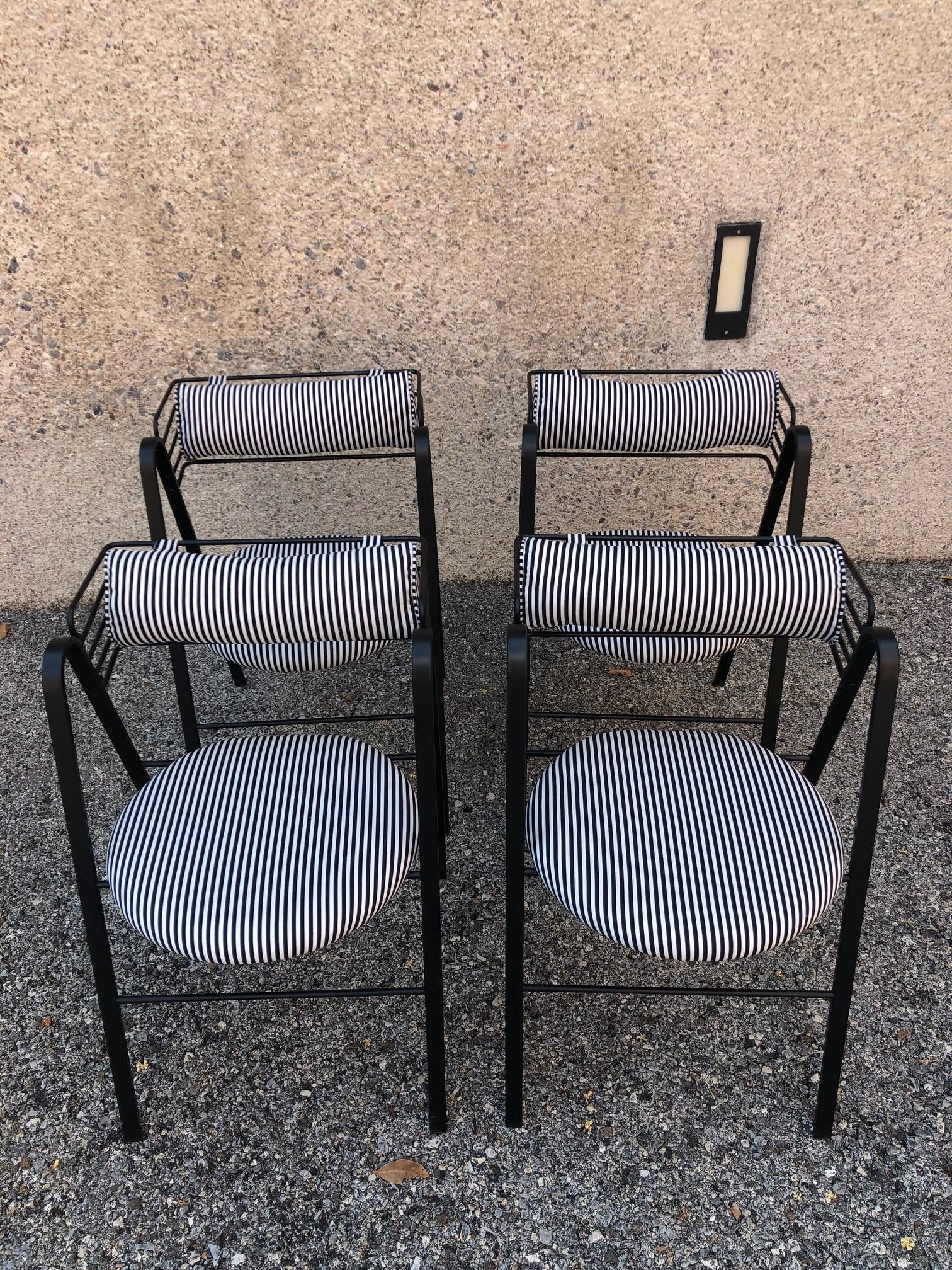 Set of 4 chairs in the style of Mario Botta.
Metal structure, seat and backrest with new upholstered
Italy, 1990s.