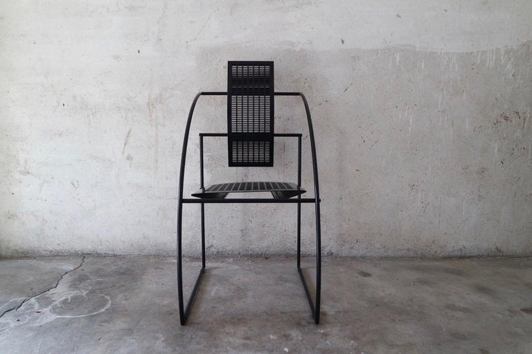 Set of ten chairs Quinta in black painted steel, back and seat in perforated metal sheet. 
Designed by Mario Botta for Alias in 1985.
 