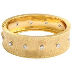 Mario Buccellati 18 Karat Yellow Gold and Diamond Bangle Bracelet, circa 1970s