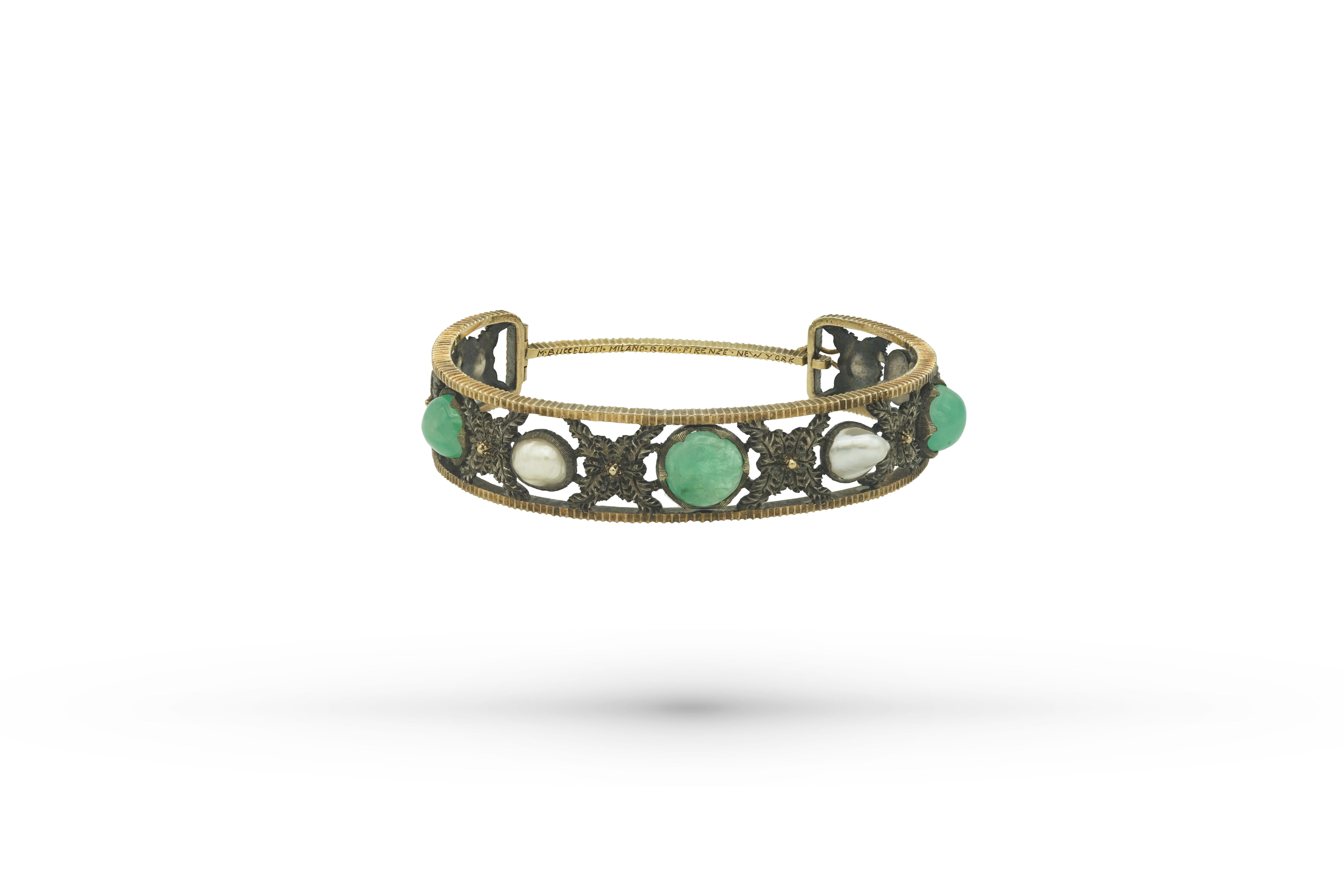 Mario Buccellati Bracelet in yellow gold, silver, set with emeralds and pearls.
Made in 1920. 
22,9 grs