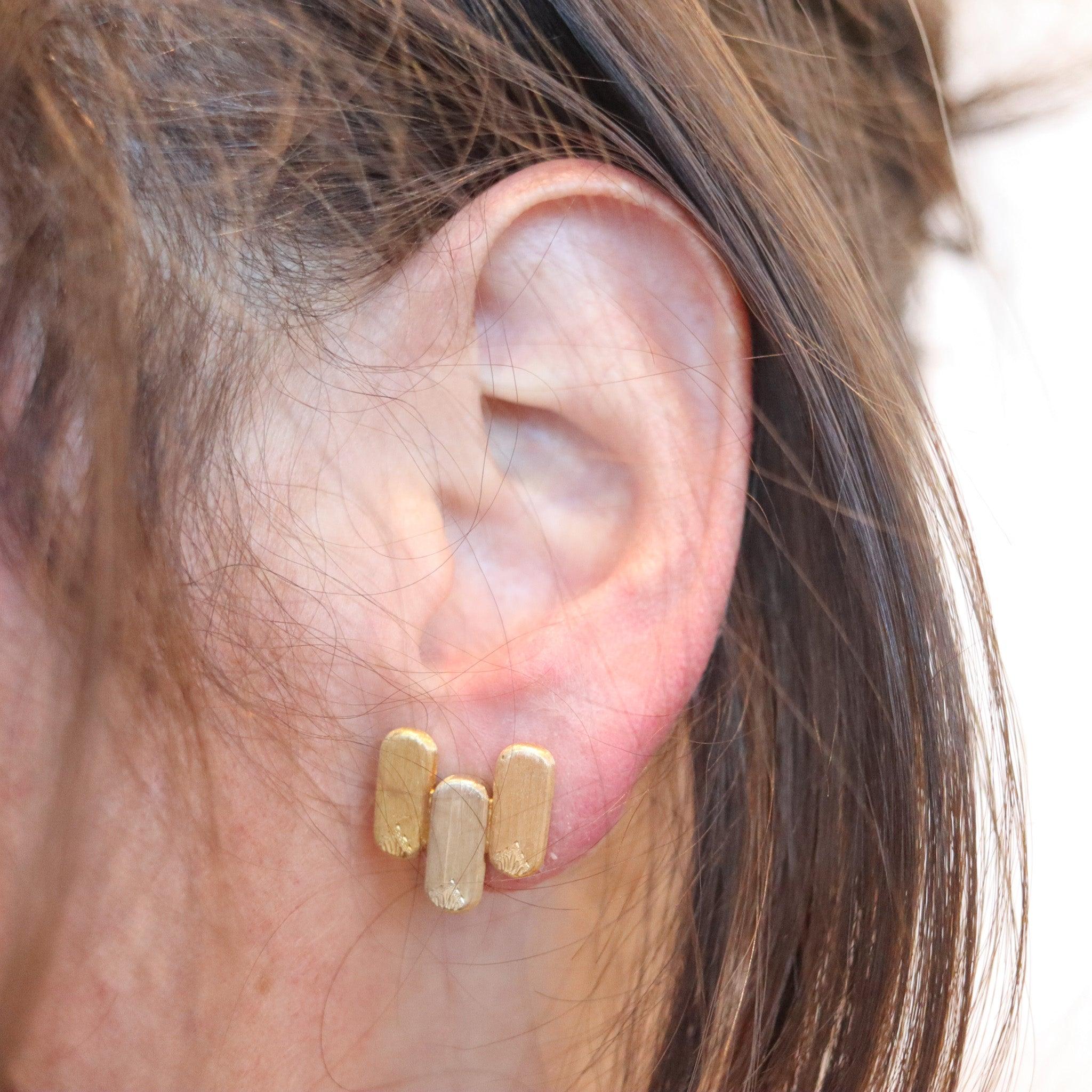 Clips-on earrings designed by Mario Buccellati (1891-1965).

This is a beautiful vintage pair of everyday clips-on earrings created in Milano Italy by the jewelry house of Mario Buccellati back in the 1965. The rare earrings have been masterfully