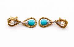 Mario Buccellati 1970 Orecchini pendenti in oro 18Kt con turchesi e perle