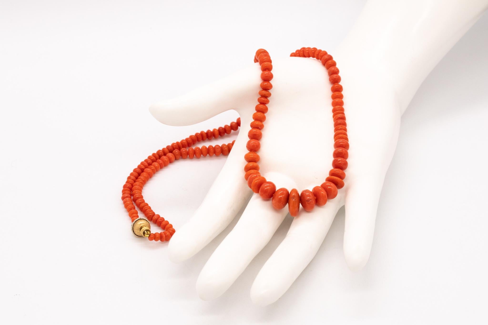 A graduated coral necklace designed by Mario Buccellati.

Beautiful piece mounted with 160 graduated round cabochons cut of natural Sardinian red coral. This necklace is suited at the ends with a screw lock crafted in 18 karats yellow gold and