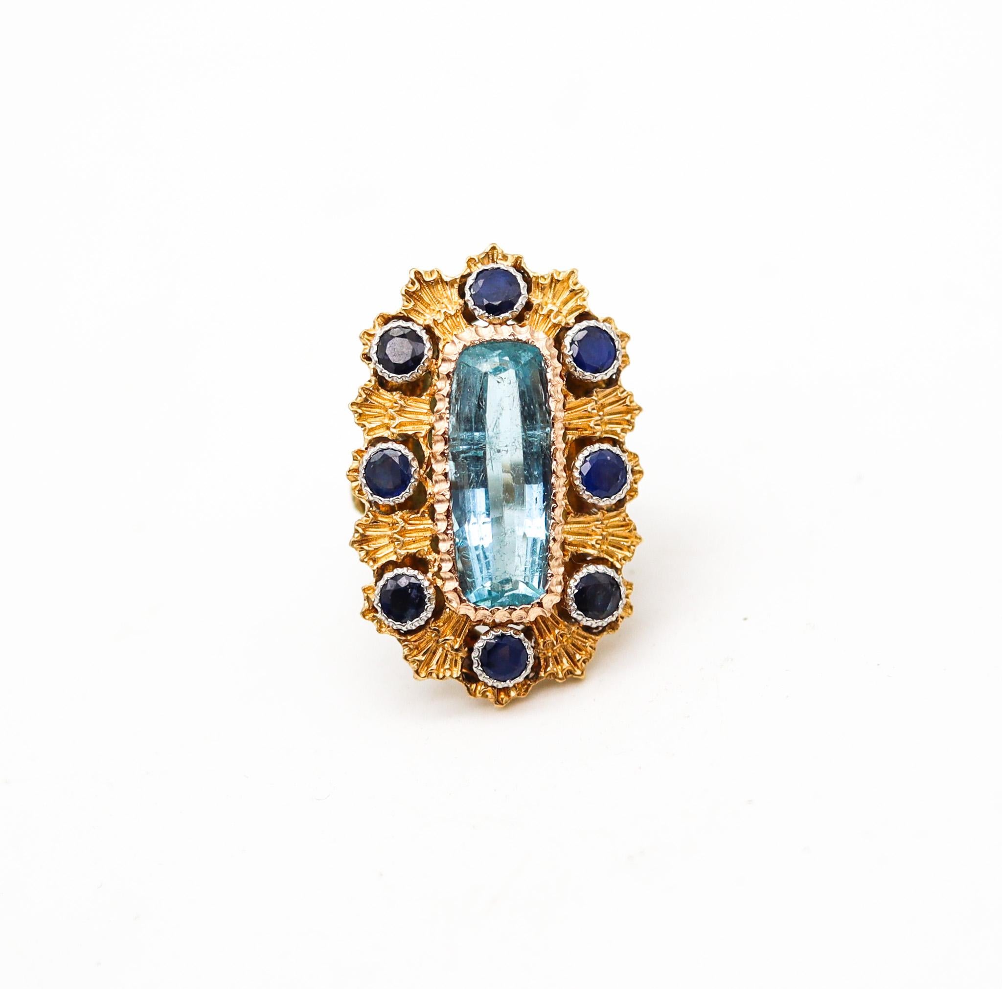 Cocktail ring designed by Buccellati.

A fastuous aquamarine and sapphires cocktail ring, made in Milan Italy by the iconic jewelry house of Buccellati, back in the 1970. This colorful piece was part of the Maison collection privee and was carefully