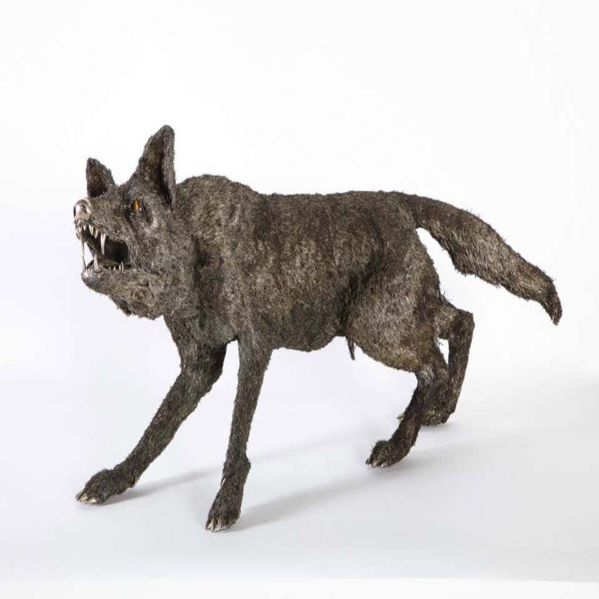 Mario Buccellati, a rare and exceptional nearly life-size Italian silver wolf, Milan, circa 1970  

With tiger-eye eyes, engraved Buccellati Italy under one paw.  

Retail price in the Buccellati store was $120,000.  

Very fine quality and