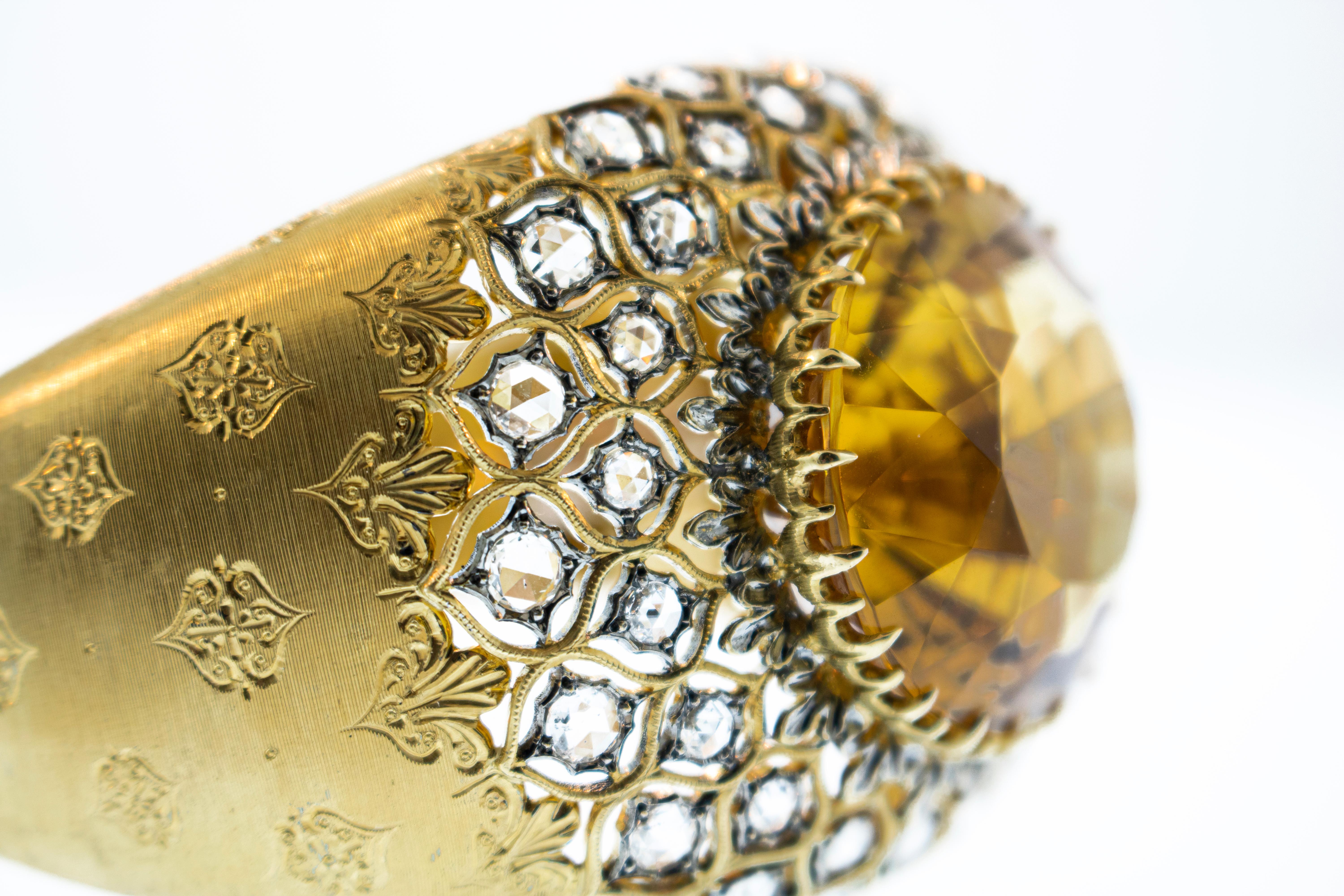 Beautiful 18k solid gold citrine Buccellati bracelet. Bracelet weighs 70.85 penny weights, citrine is approximately 50 carats surrounded by older European cut diamonds. Total carat weight of diamonds is around 8 carats, but range from VS1-SI1 and