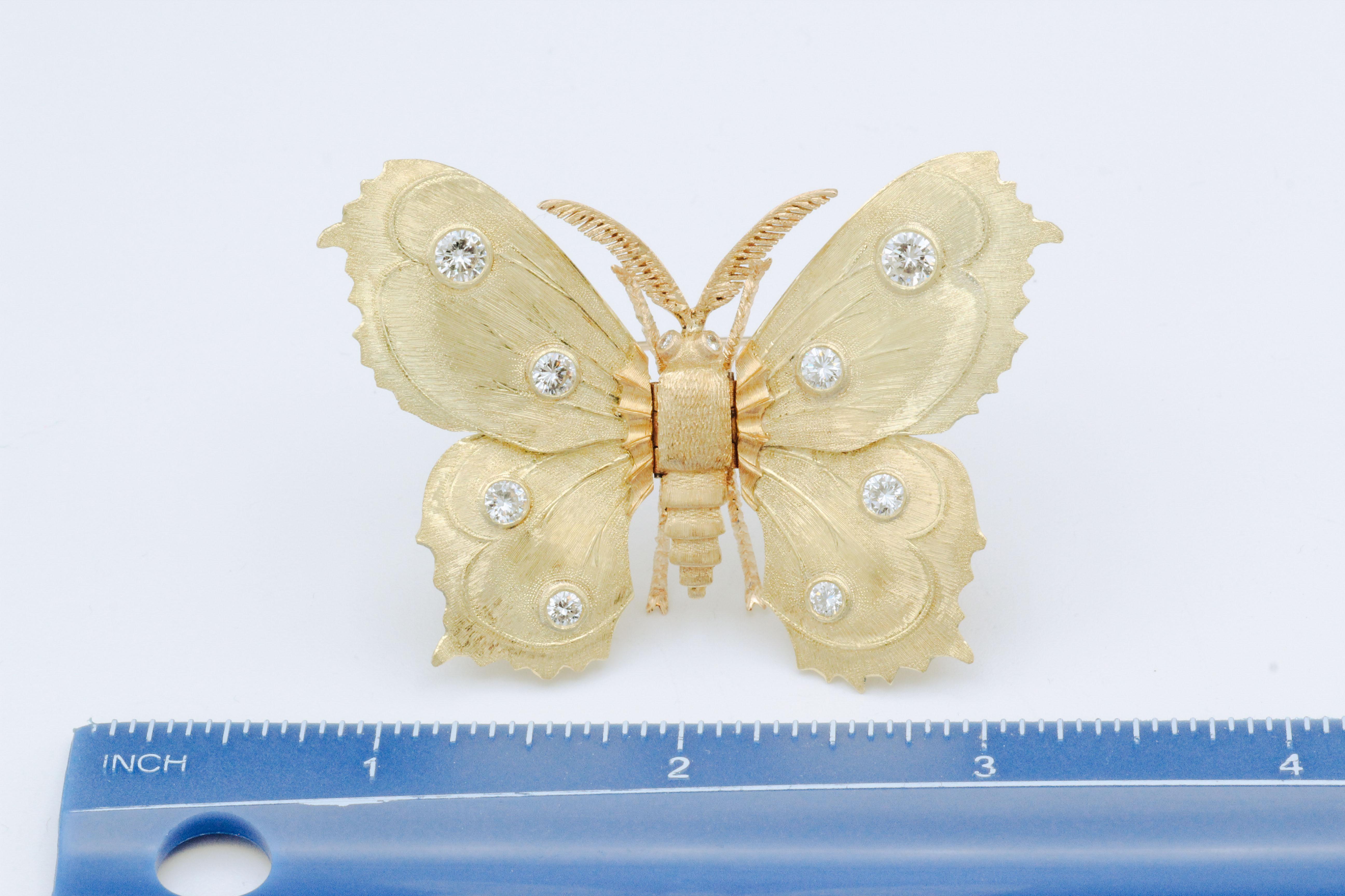 Very fine diamond and 18K yellow gold butterfly brooch by Mario Buccellati. Featuring high grade round brilliant cut diamonds over an 18K gold setting, this beautiful brooch is over 2 inches wide and weighs 27.2 grams. Exceptional workmanship by