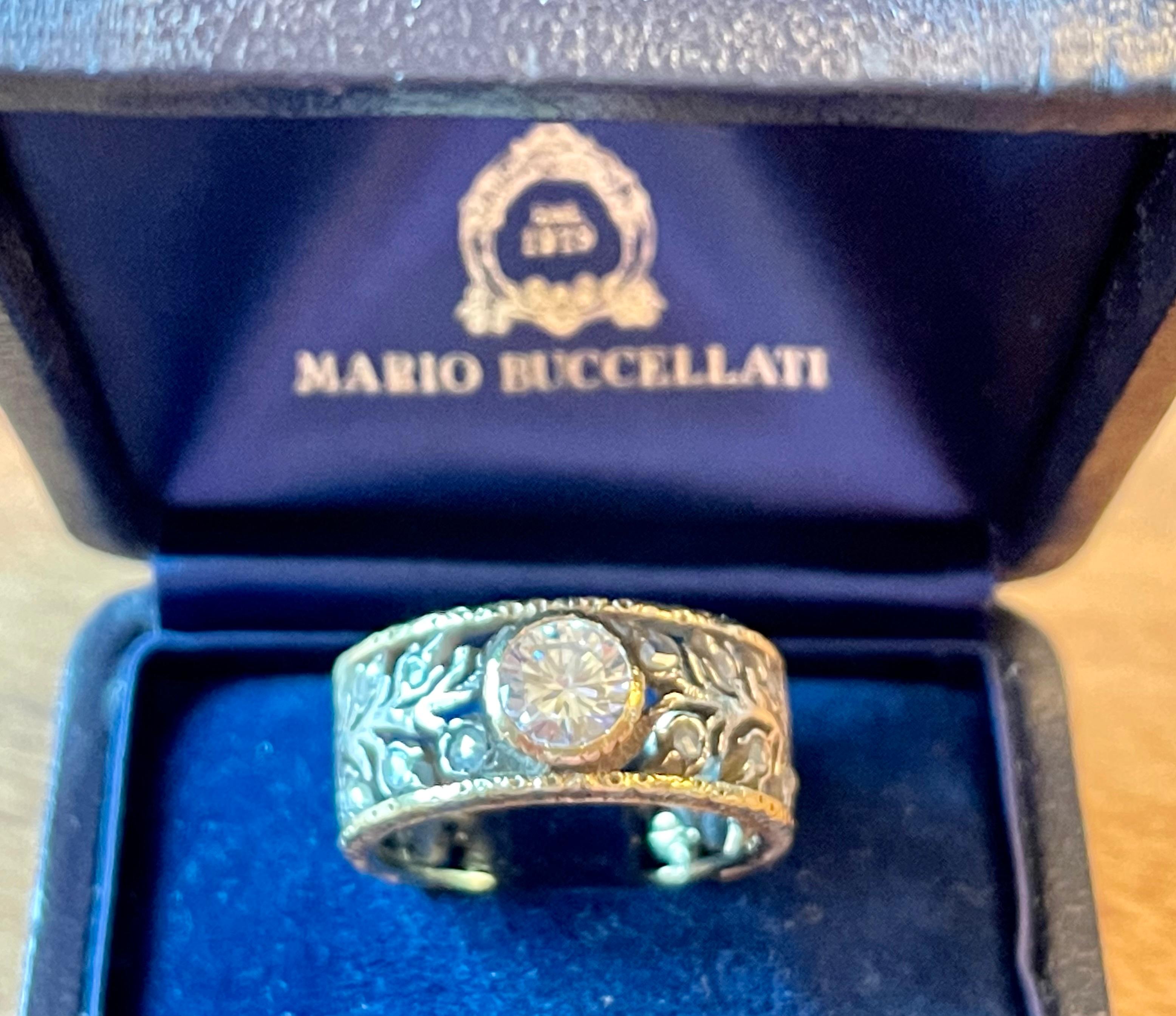 A lovely and very typical Band Ring by Mrio Buccellati bezel set with brilliant cut Diamond weighing approximately 1 ct, H color, vs clarity. 
The ring is currently size 18/58 and (US ring size 9) can only be resized smaller. Width of the band ring: