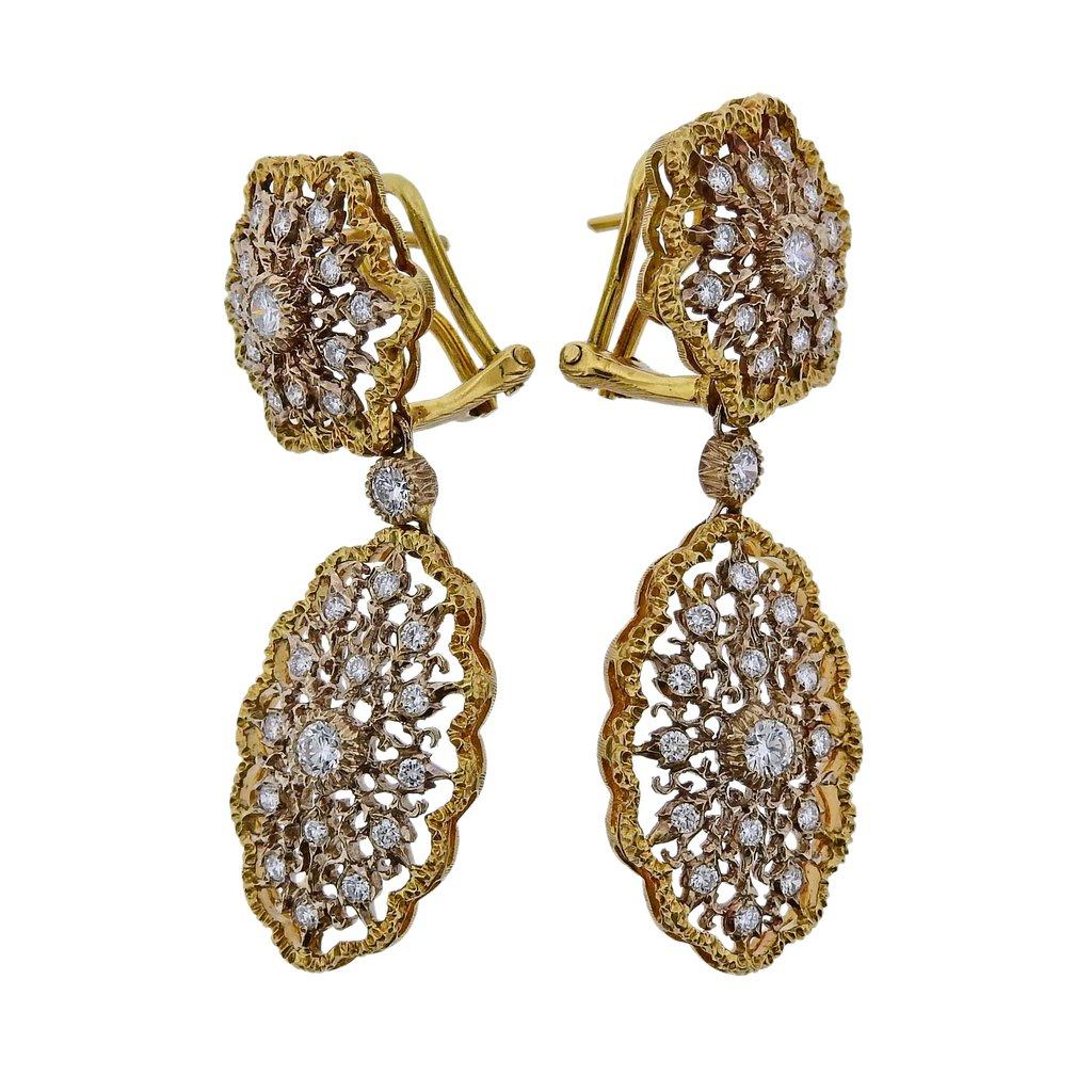 Exquisite pair of 18k gold openwork Mario Buccellati earrings, set with  approx. 1.64ctw in H/VS diamonds. Earrings are 48mm x 20mm and weigh 15.3 grams. Marked M. Buccellati, Italy, 18k.
