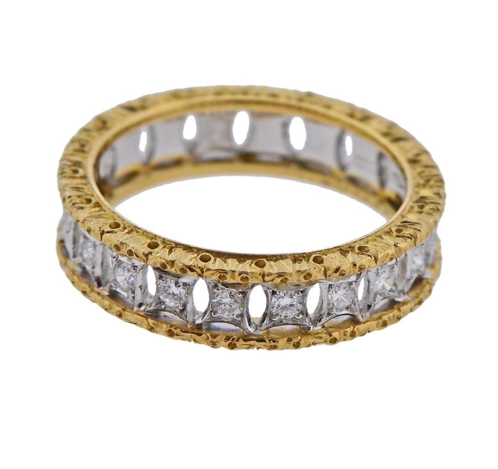 Classic 18k white and yellow gold wedding band ring by Mario Buccellati. Adorned with approx. 0.24ctw in H/VS-SI diamonds. Ring size - 6.25, ring is 7.8mm wide. and weighs 5.1 grams. Marked M. Buccellati,  Italy, 750.