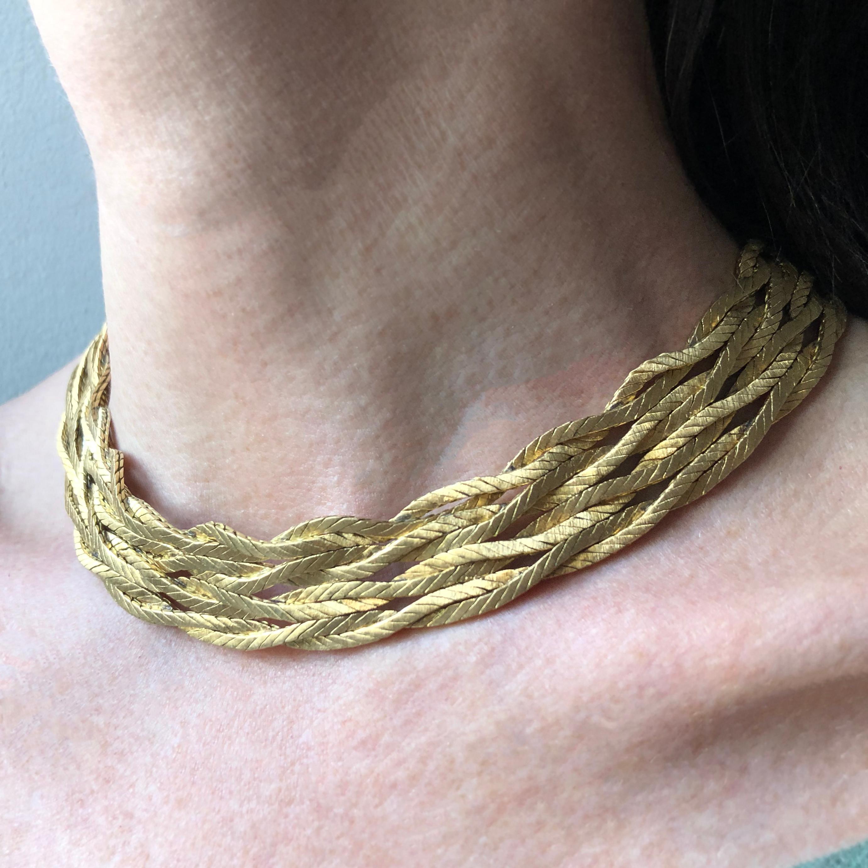 An 18 karat gold 8-strand necklace, by Mario Buccellati. 

Signed M. Buccellati. 