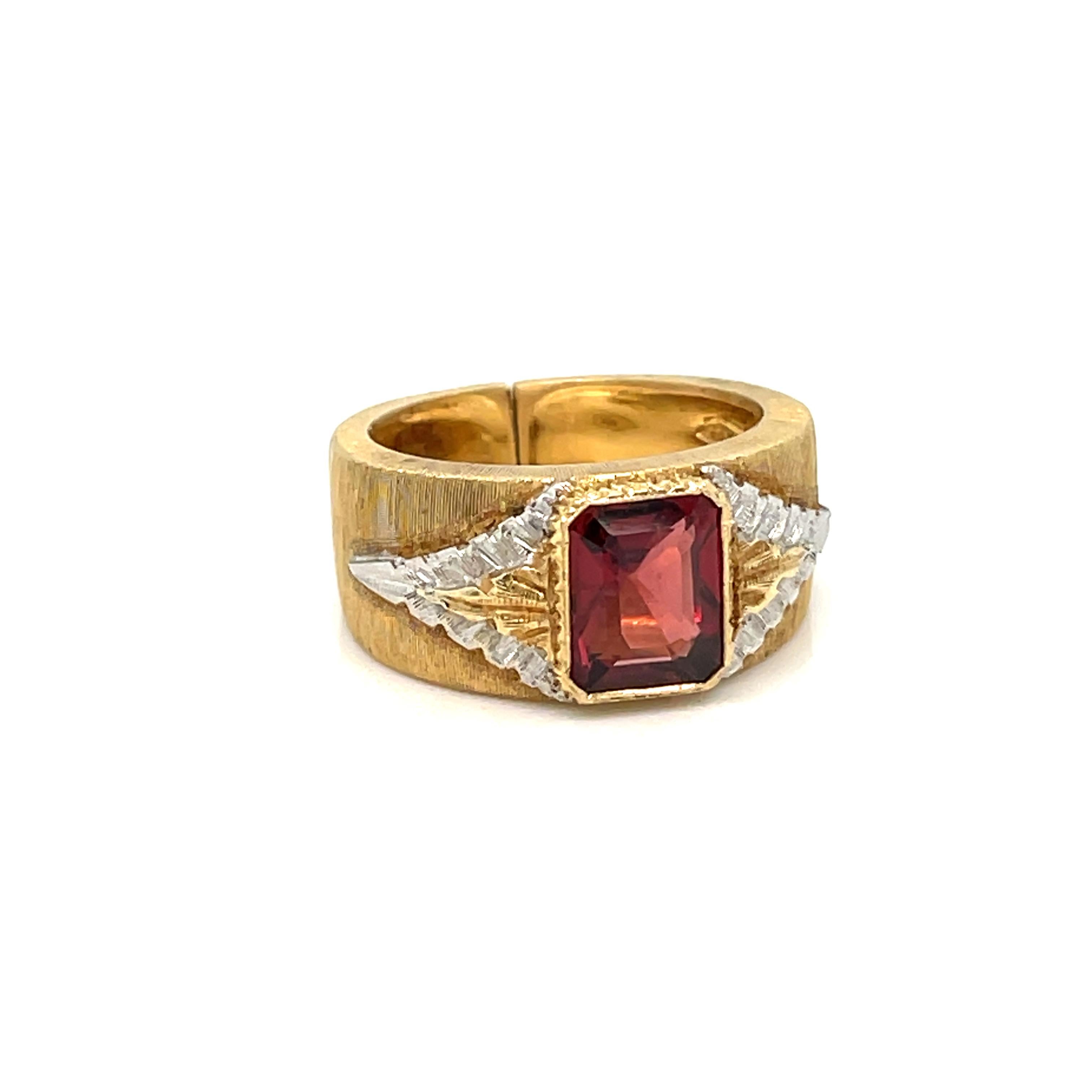Beautiful Mario Buccellati Engraved ring, handcrafted in 18k yellow and white Gold, featuring in the center a natural Garnet, 2 carats  
Circa 1970

The magical iridescent effect of the gold surface, given by the very fine 