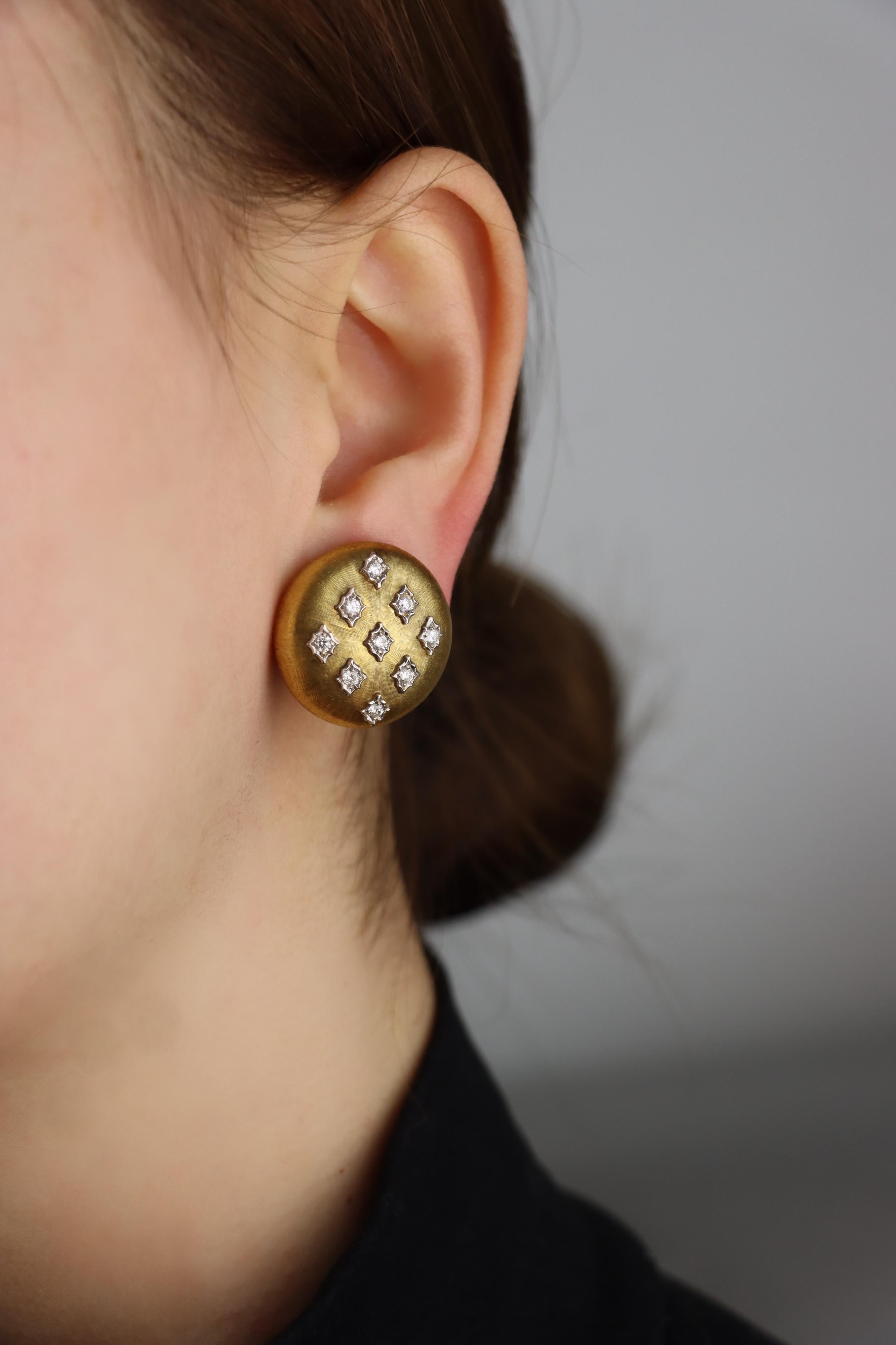 Mario Buccellati Geminato 18K Gold Diamond Earrings

Marked:
750
Buccellati 
Italy

Approximate Dimensions:
2.2 cm (Diameter) 
16.5 grams in weight.
