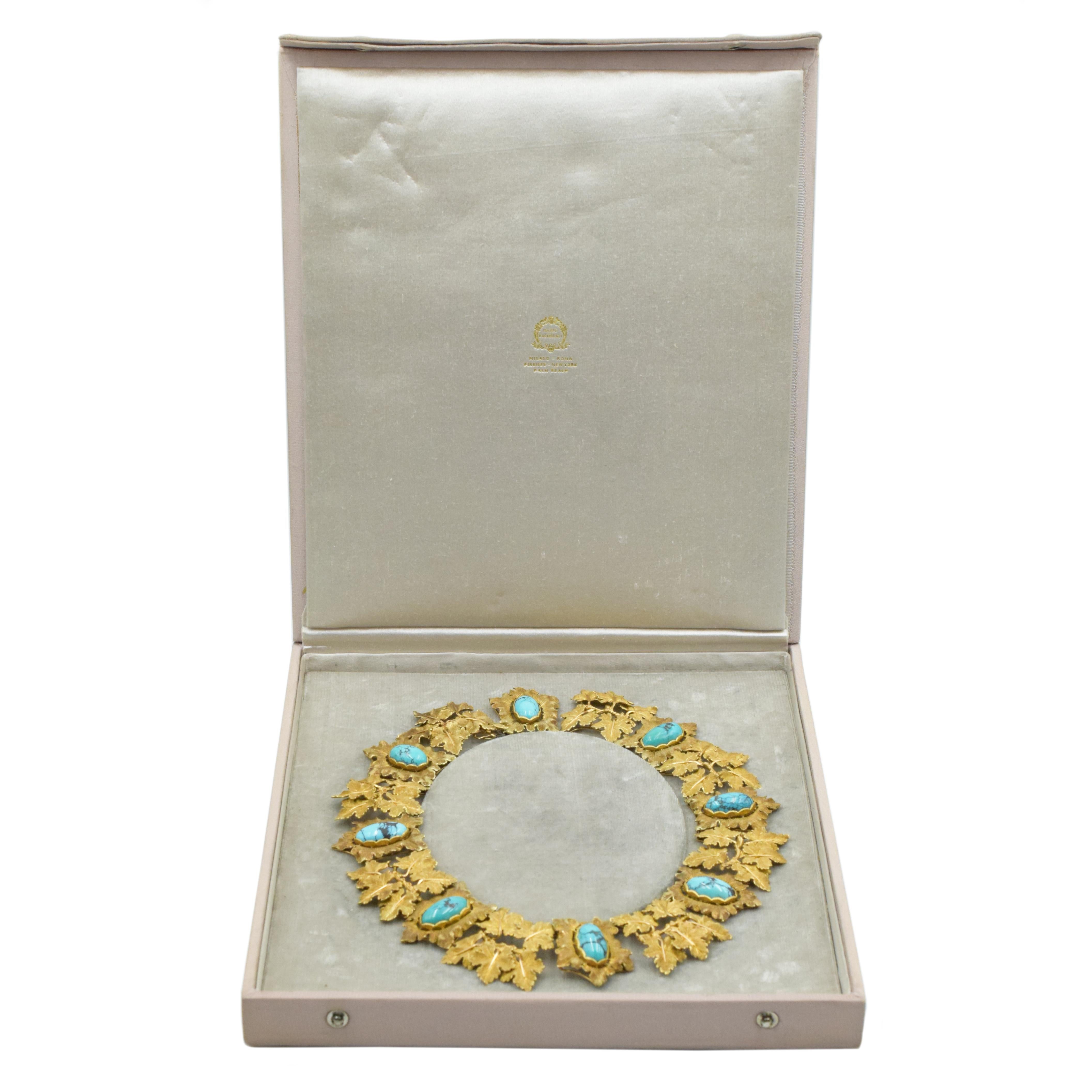 Mario Buccellati Gold and Turquoise Necklace  with wide links designed as clusters of textured leaves, spaced by eight oval matrix turquoise approximately  19.0 x 10.0 mm. to 15.5 x 9.8 mm., within textured leaves, Signed M. Buccellati, Made in