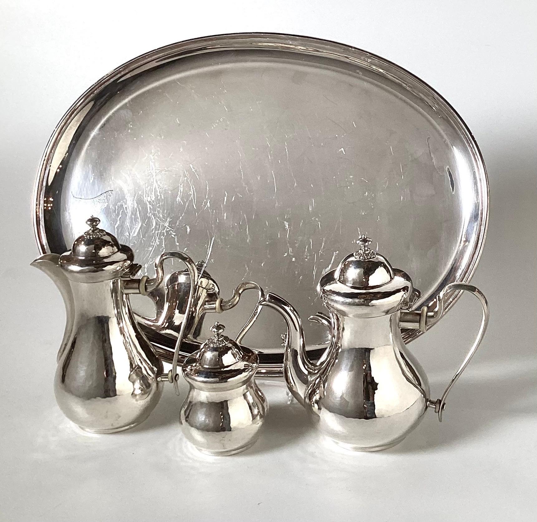 Very nice signed .800 silver coffee/ tea set by Mario Buccellati
Tray is 16