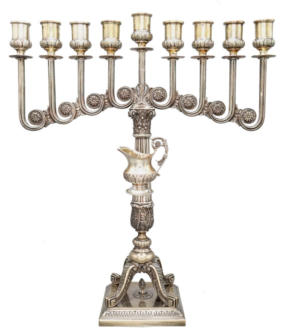 Italian Mid-Century 
Mario Buccellati
Hanukkah Menorah
Sterling Silver 
Circa 1950s

DIMENSIONS
Height: 18.25 inches
Width: 16 inches
Weight: 87 ozt (2700 g)

DETAILS
Hallmarked “Mario Buccellati, 925°,     15  MI’
 
ABOUT THE MENORAH 
This stunning