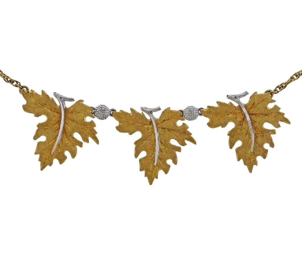 18k yellow gold necklace by Mario Buccellati, featuring three leaves pendant. Comes with a COA. Necklace is 16