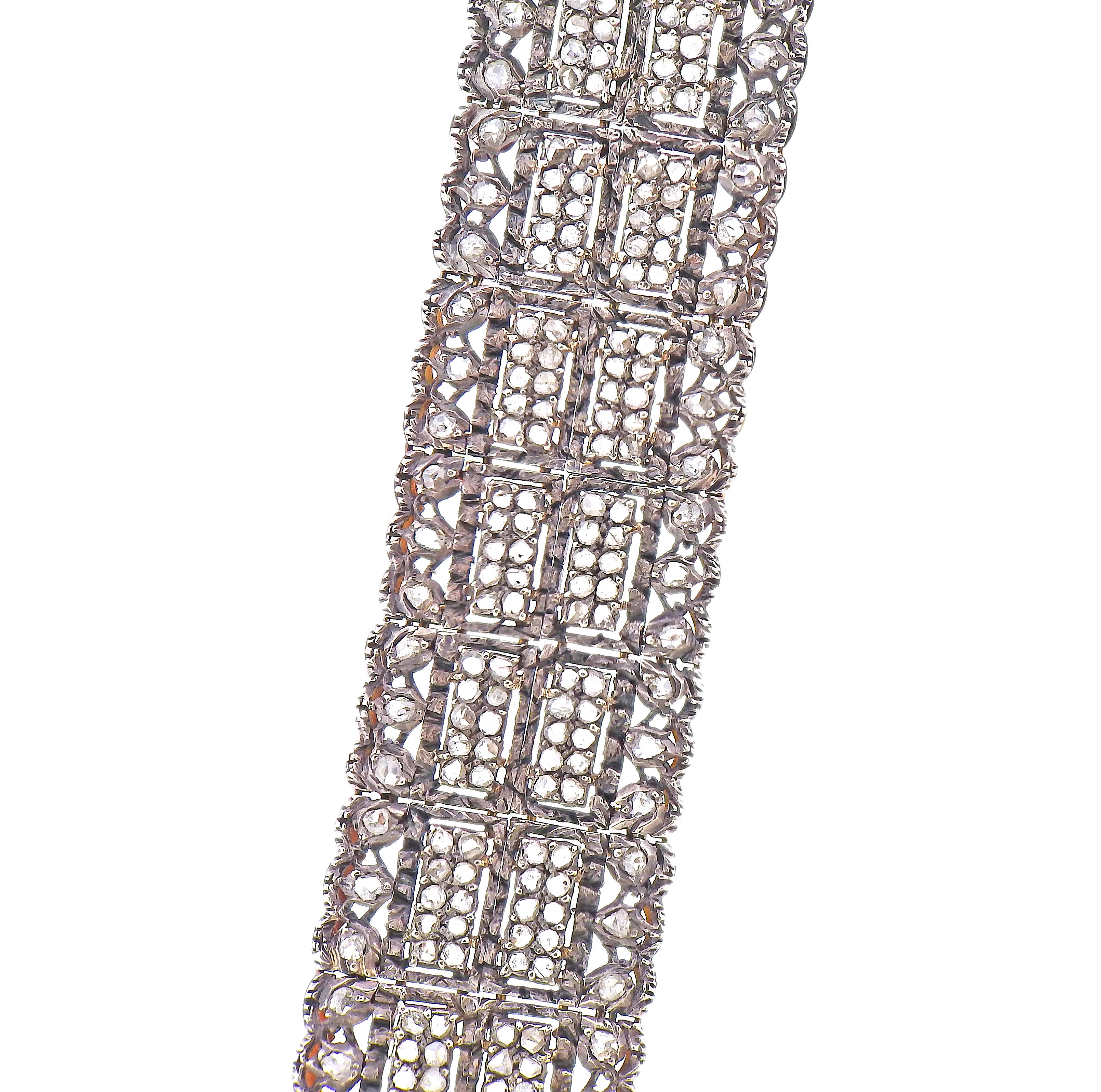 Vintage Mario Uccellati bracelet in silver and 18k gold, set with rose cut diamonds. Bracelet is 6 7/8