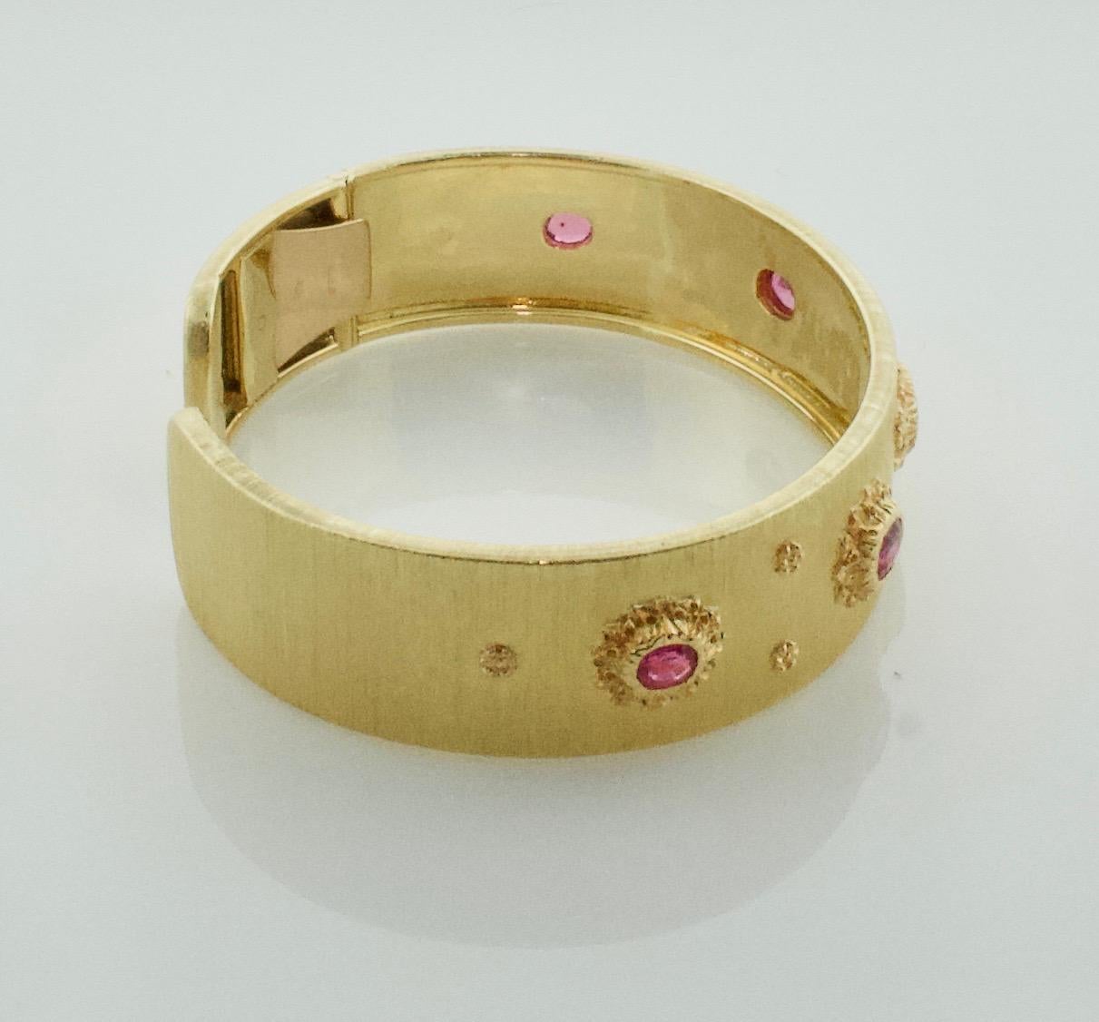 Oval Cut Mario Buccellati Ruby Bangle Bracelet in 18 Karat Yellow Gold