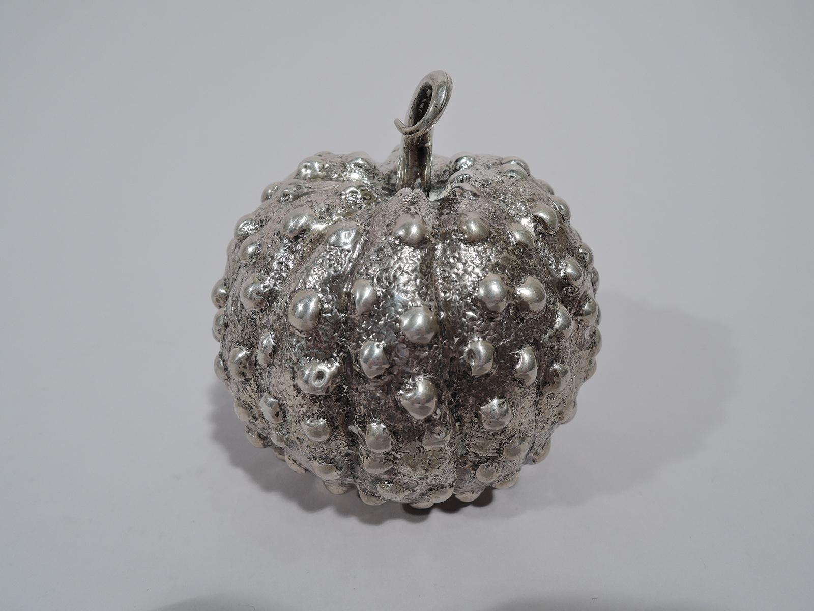 Midcentury silver figural lighter. Made by Mario Buccellati in Italy. Gourd-form body with lobing and irregular studding on stippled skin; curlicue stem. Detachable lighter. Marked “Mario / Buccellati / SRL”. Weight (without lighter): 3.5 troy