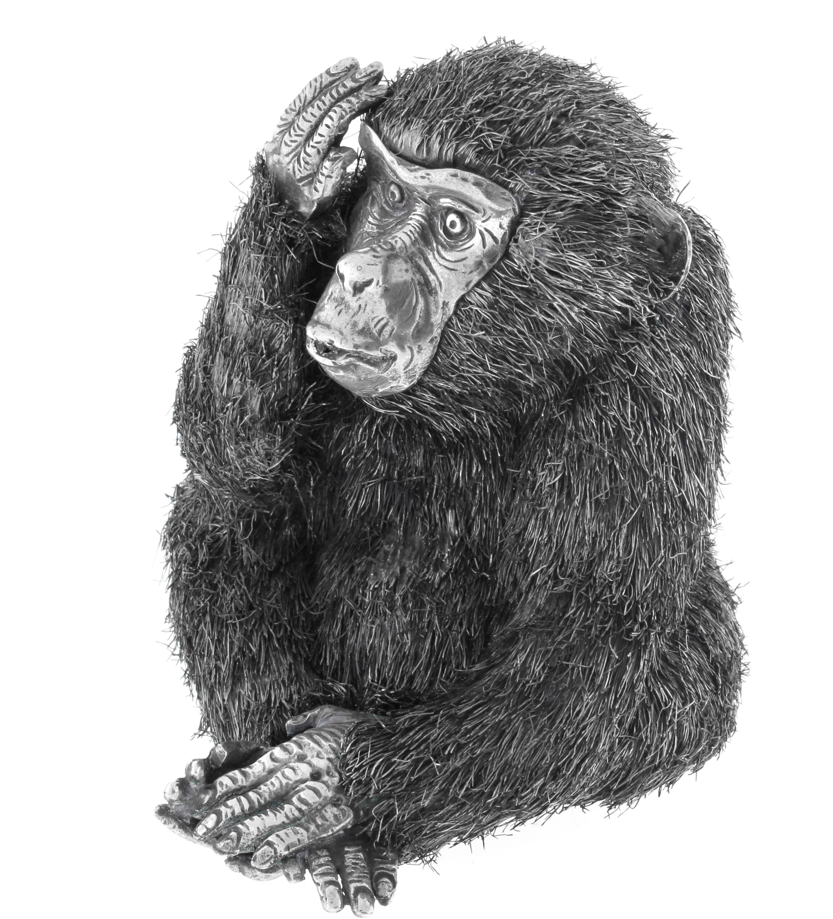 From acclaimed Italian jeweler Mario Buccellati, a realistically modeled seated monkey, with textured fur in silver wire.
Measurement 3¾ inches high
Signed: Buccellati
Metal: 800 silver
Italy circa 1960
