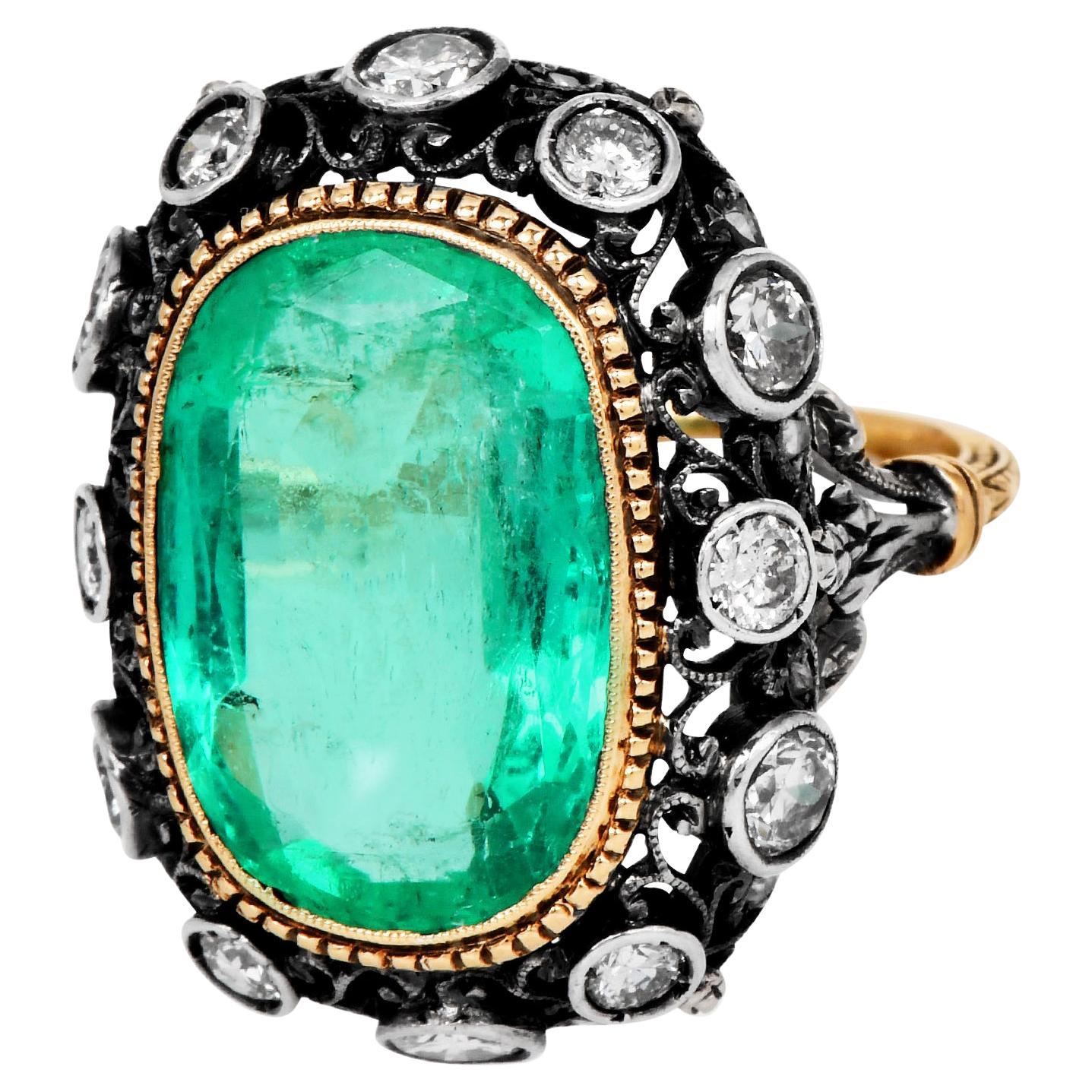 Rare Vintage Mario Buccellati cocktail Emerald gold and silver ring. It features a breathtaking 7.10-carat Colombian emerald, certified by the CSIGEM Lab.

The elongated oval emerald, with rounded edges, is clarity-enhanced and bezel-set in 18K