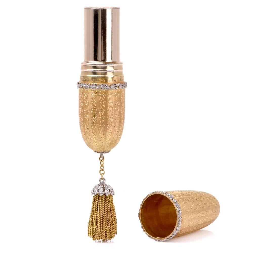 Bejewelled, elaborate and delicate, this vintage circa 1950's tassel lipstick case is the essence of elegance. Miniatures demonstrate the most elevated type of craftsmanship by Mario Buccellati. From the inside to the outside, engineering these