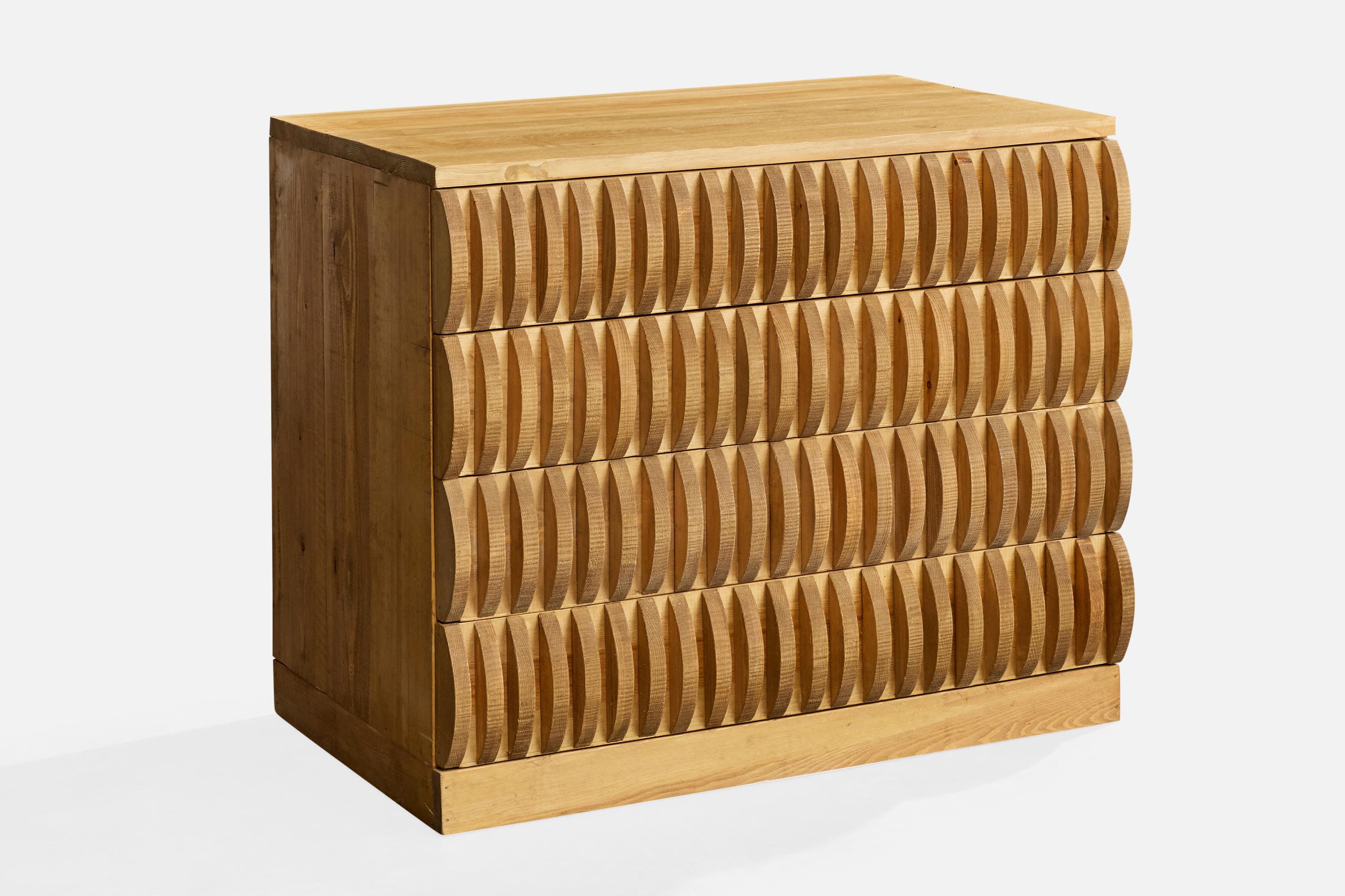 A pine chest of drawers designed by Mario Ceroli and produced by Poltronova, Italy, c. 1970s.

Patina buildup on drawer face details.

Mild to moderate imperfections.

Minor wear to inside of drawers.

Overall Dimensions (inches): 38.0