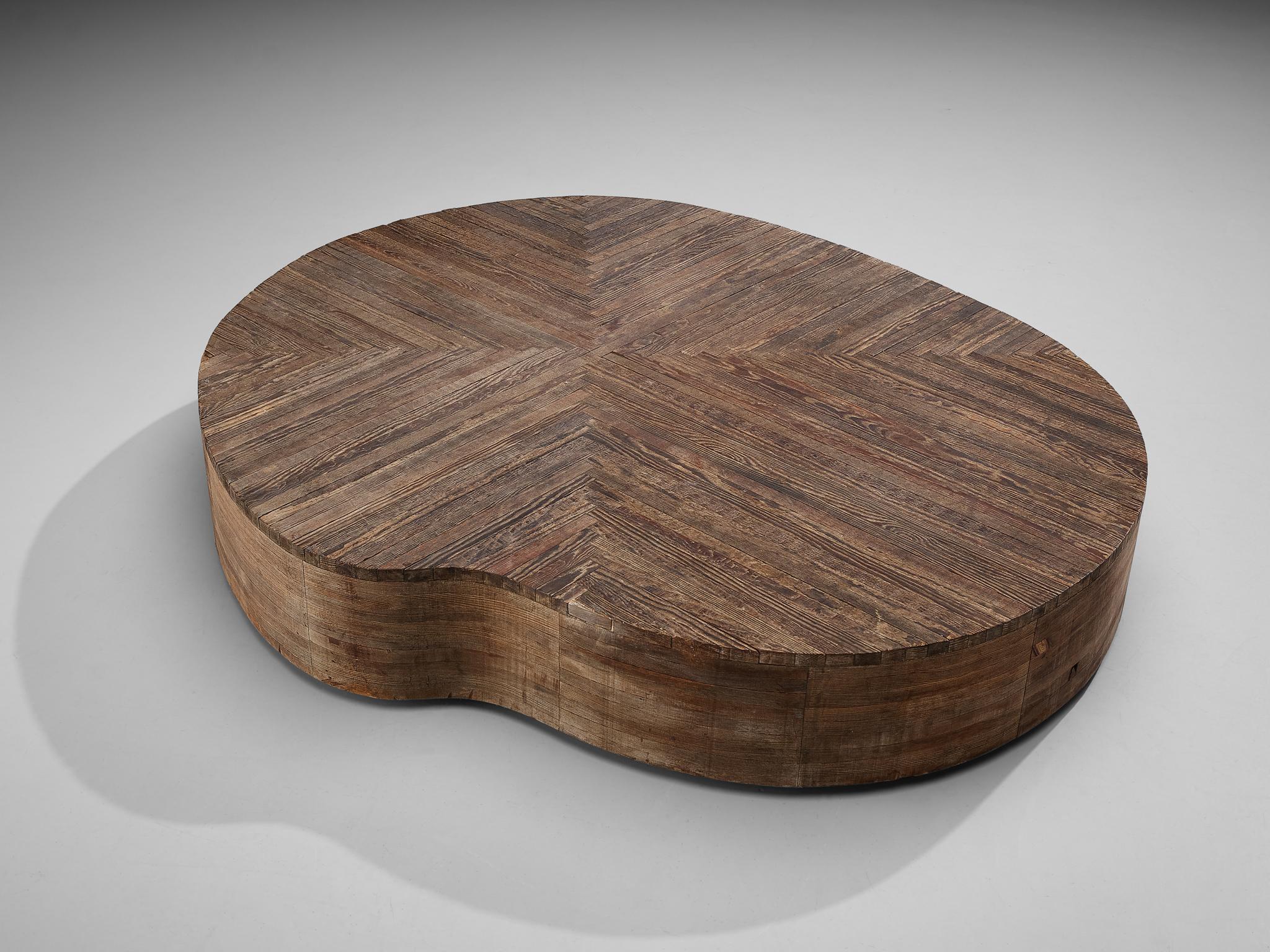 Mario Ceroli for Poltronova, coffee table, pine, Italy, 1970s

Stunning freeform coffee table in pine-wood by Italian designer Mario Ceroli for Poltronova. This low coffee table shows not only a great, round shape but also a beautiful top with pine