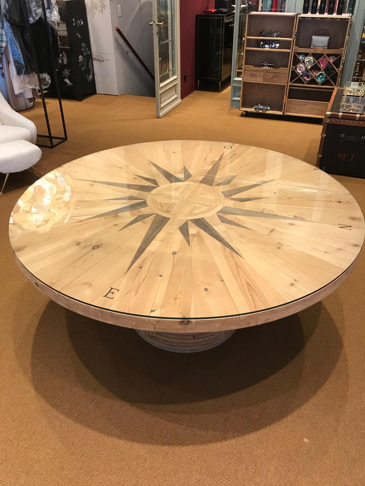 Mario Ceroli Rosa dei Venti for Poltronova, made in Italy in 1974-1975 is a timeless piece easy to use as a table for dinner or meeting room office table.
Luxurious inlaid top representing the four cardinal points, made of untreated Russian pine