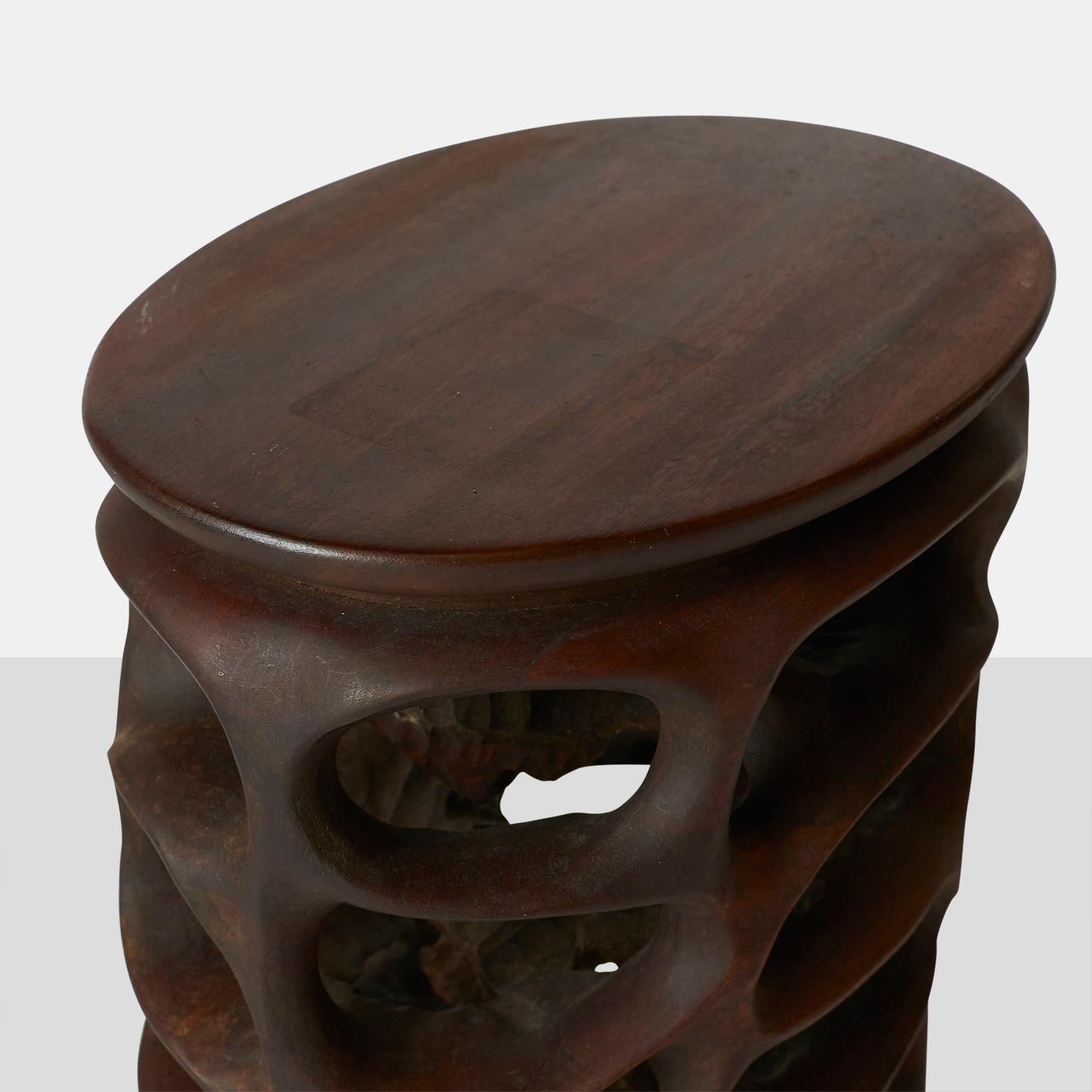An occasional table carved from wengé and mahogany. The artist has carved the date and his signature to underside: [1979 Mario Dal Fabbro].

Provenance: Acquired directly from the artist's own private collection, New York.