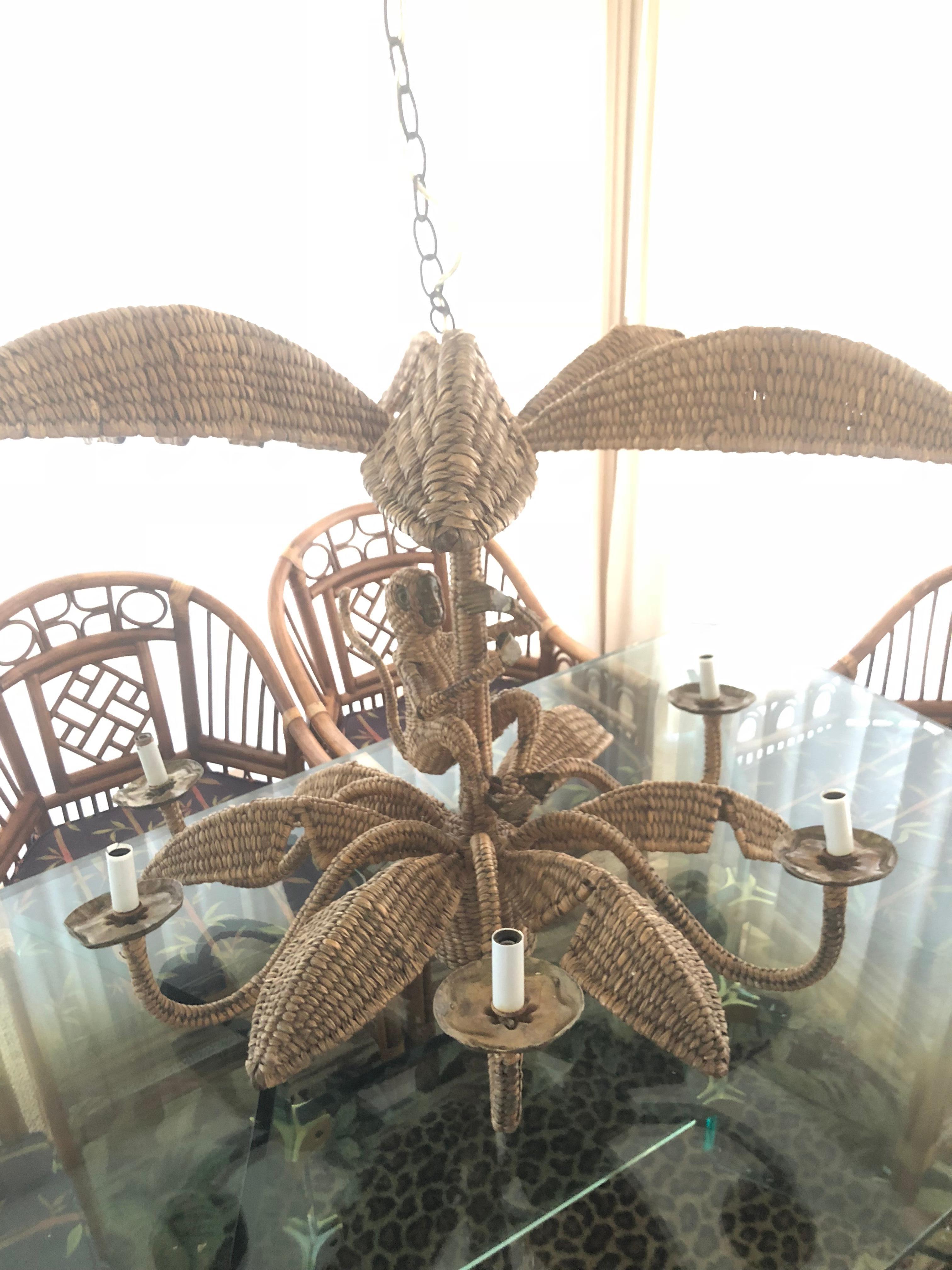 Amazing vintage Mario Lopez Torres wicker monkey six-light chandelier. New candelabra sleeves will be put on prior to shipping. Comes with ceiling canopy (pictured). Large palm tree leaves on top and bottom, monkey in the middle. Perfect for your
