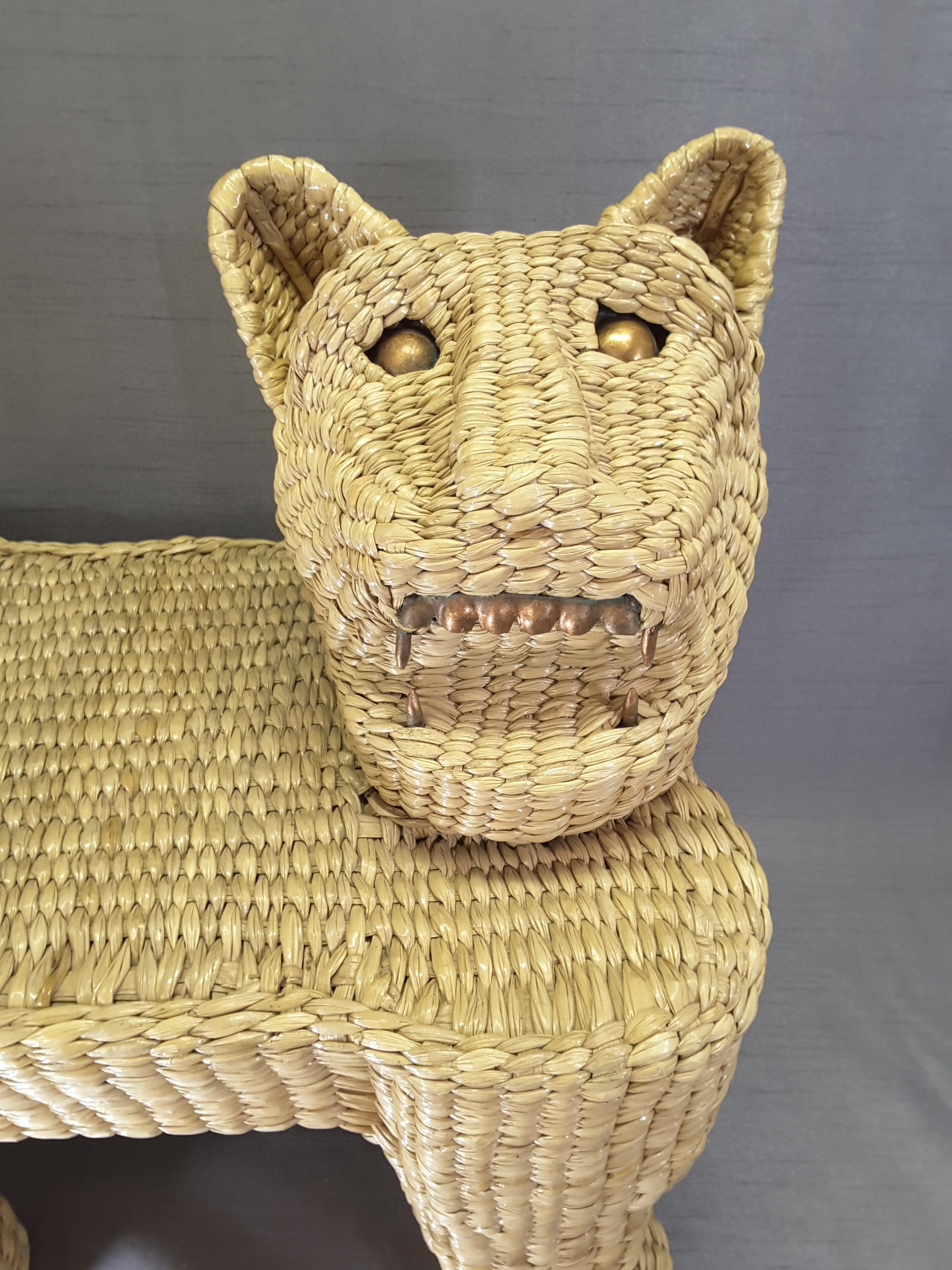 Mario Lopez Torres Wicker Panther stool, Made in the early 1970s.

Panther stool or could be used for a small table. The Panther has copper teeth and eye's, none are missing. There is no damage or missing sections, label has been removed, but will