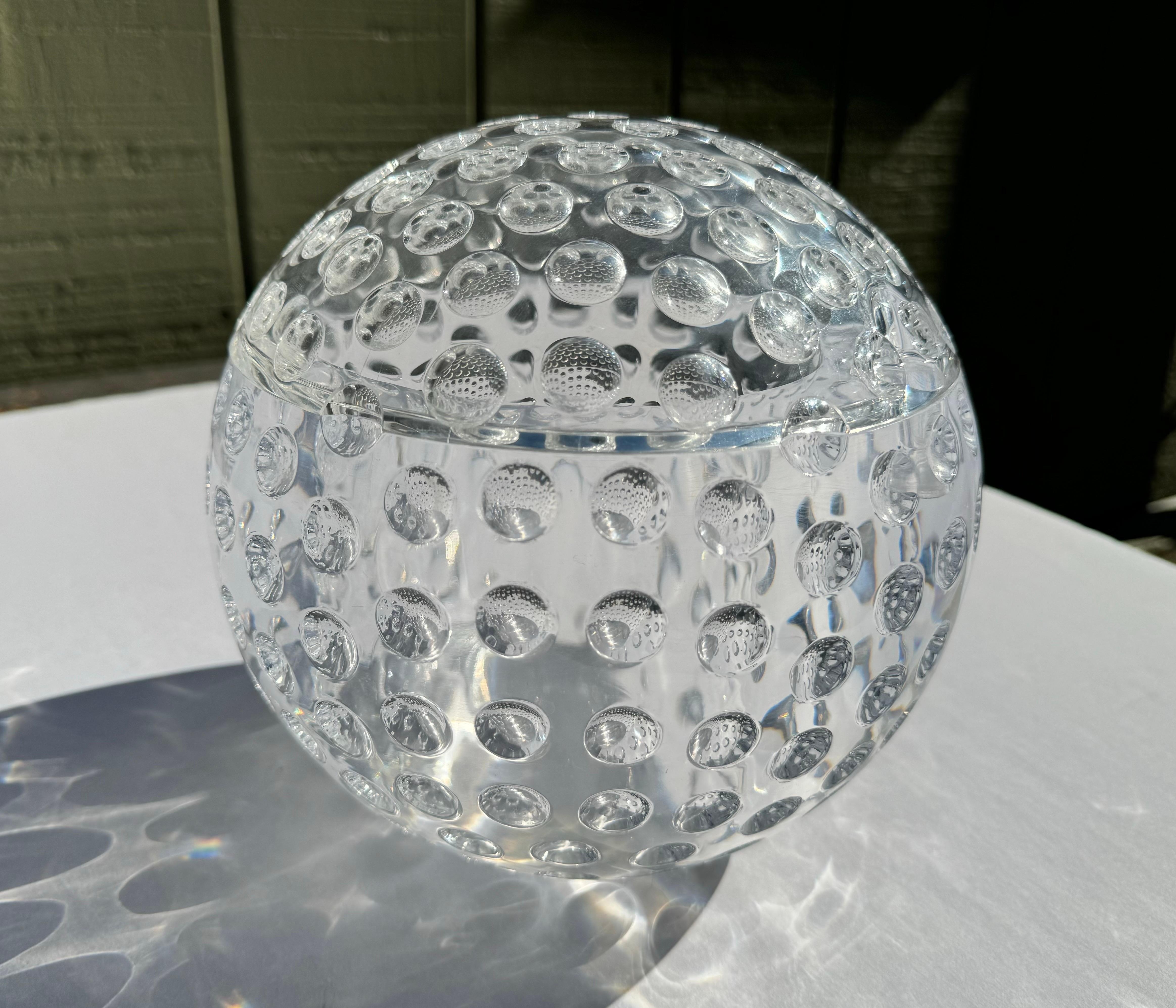 Mario Luca Giusti Lucite Ice Bucket. Wonderful design In the shape of a clear golf ball. Perfect for that golfer sportsman. Nice faceted piece which reflects the light beautifully.