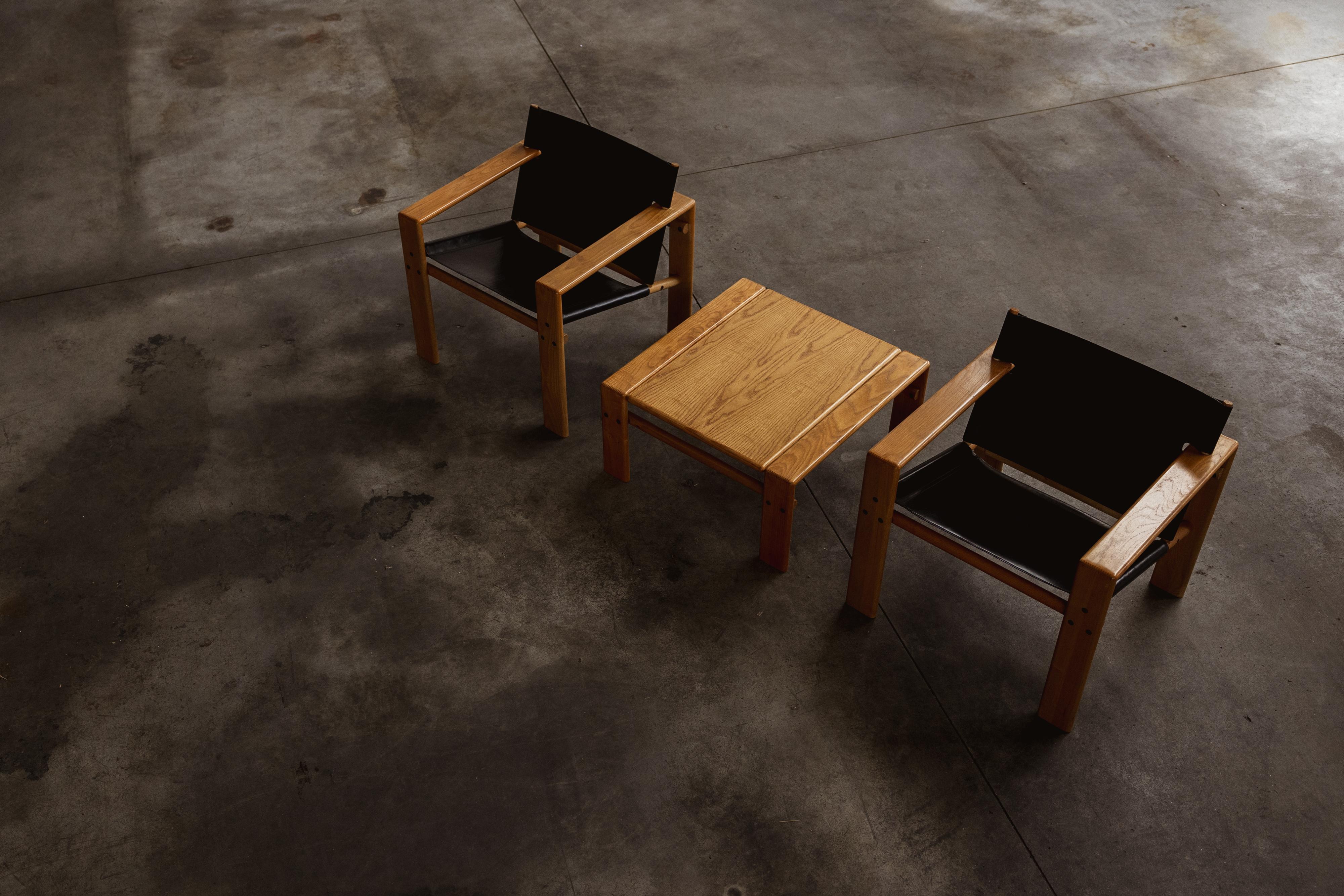Mario Marenco and Tarcisio Colzani “Laser” living room set for Mobilgirgi, wood and leather, Italy 1970, set of three.

The 