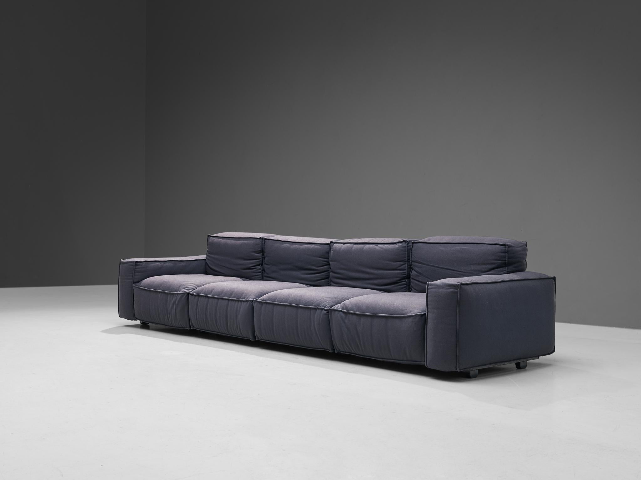 Mario Marenco for Arflex, modular four-seater sofa model 'Marechiaro', wool, plastic, metal, Italy, circa 1976.

This well-designed sofa by Mario Marenco for Arflex is fully executed in deep blue wool upholstery that contributes to the whole unit’s