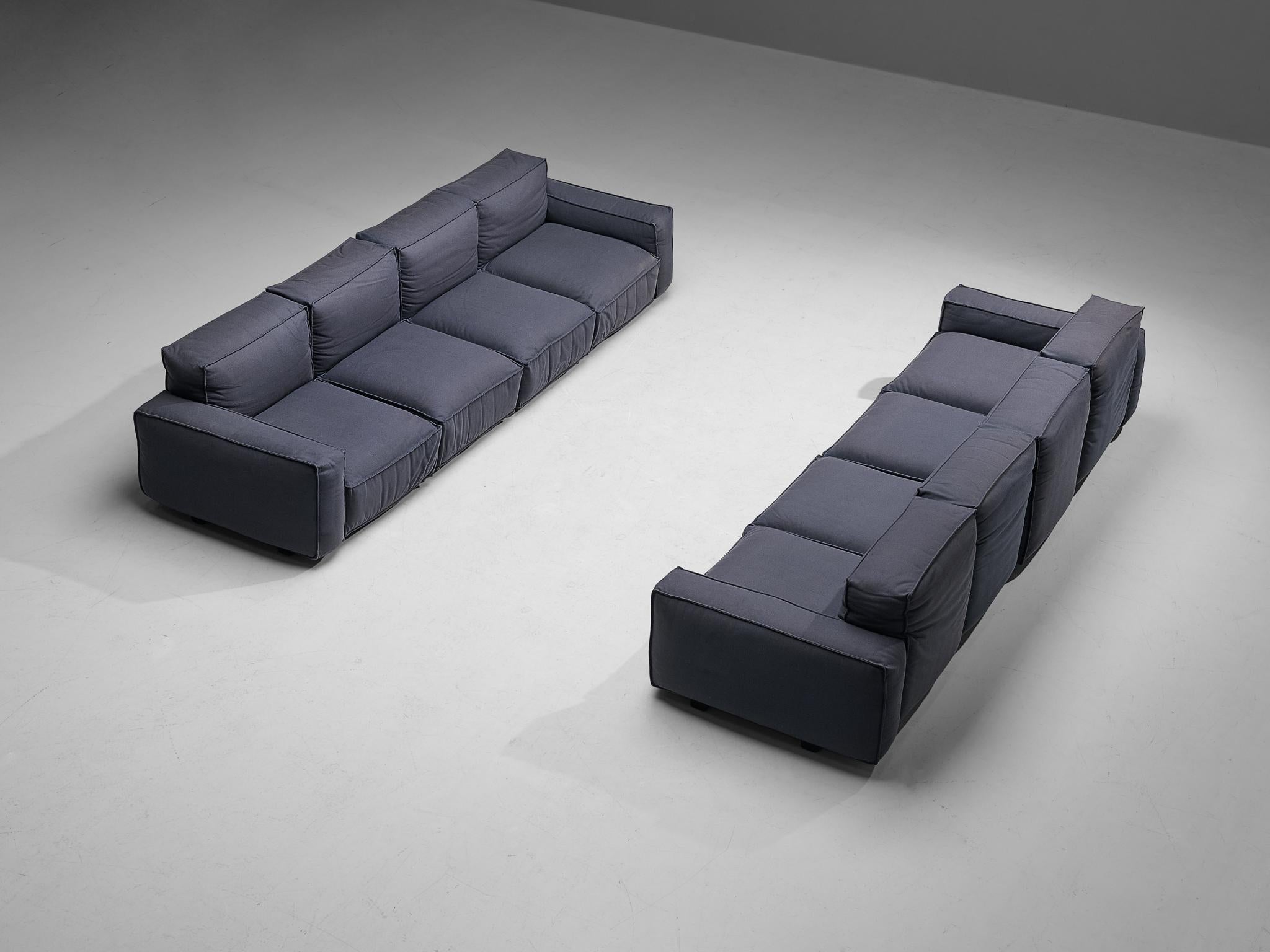 Mario Marenco for Arflex, modular four-seater sofas, model 'Marechiaro', wool, plastic, metal, Italy, circa 1976. 

This well-designed pair of sofas by Mario Marenco for Arflex is fully executed in deep blue wool upholstery that contributes to the
