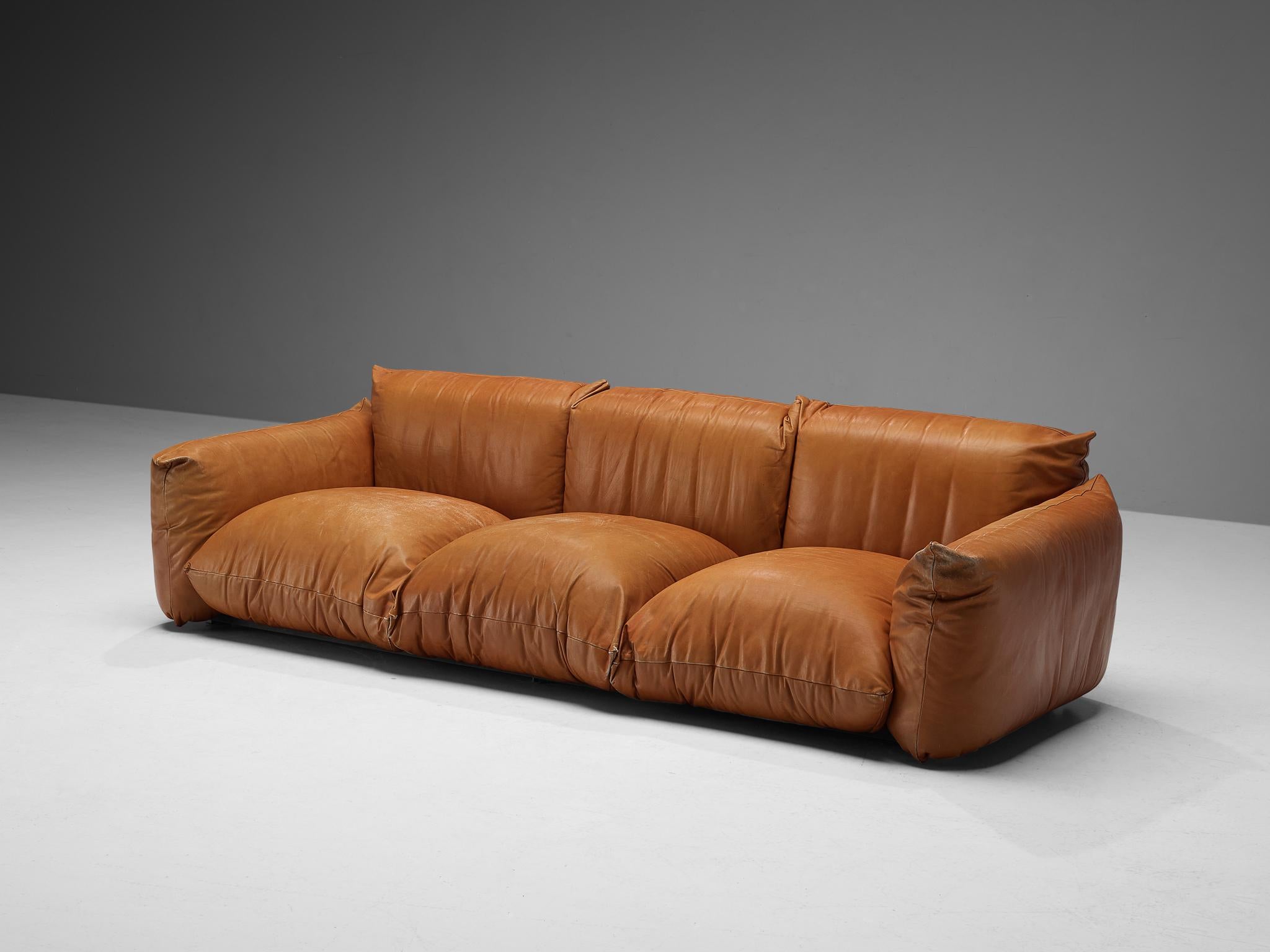 Mario Marenco for Arflex, 'Marenco' sofa, leather, Italy, design 1970

This luscious and utterly comfortable three seat sofa is designed by the Italian designer Mario Marenco in 1970. The sofa is made in a beautifully patinated cognac leather, and