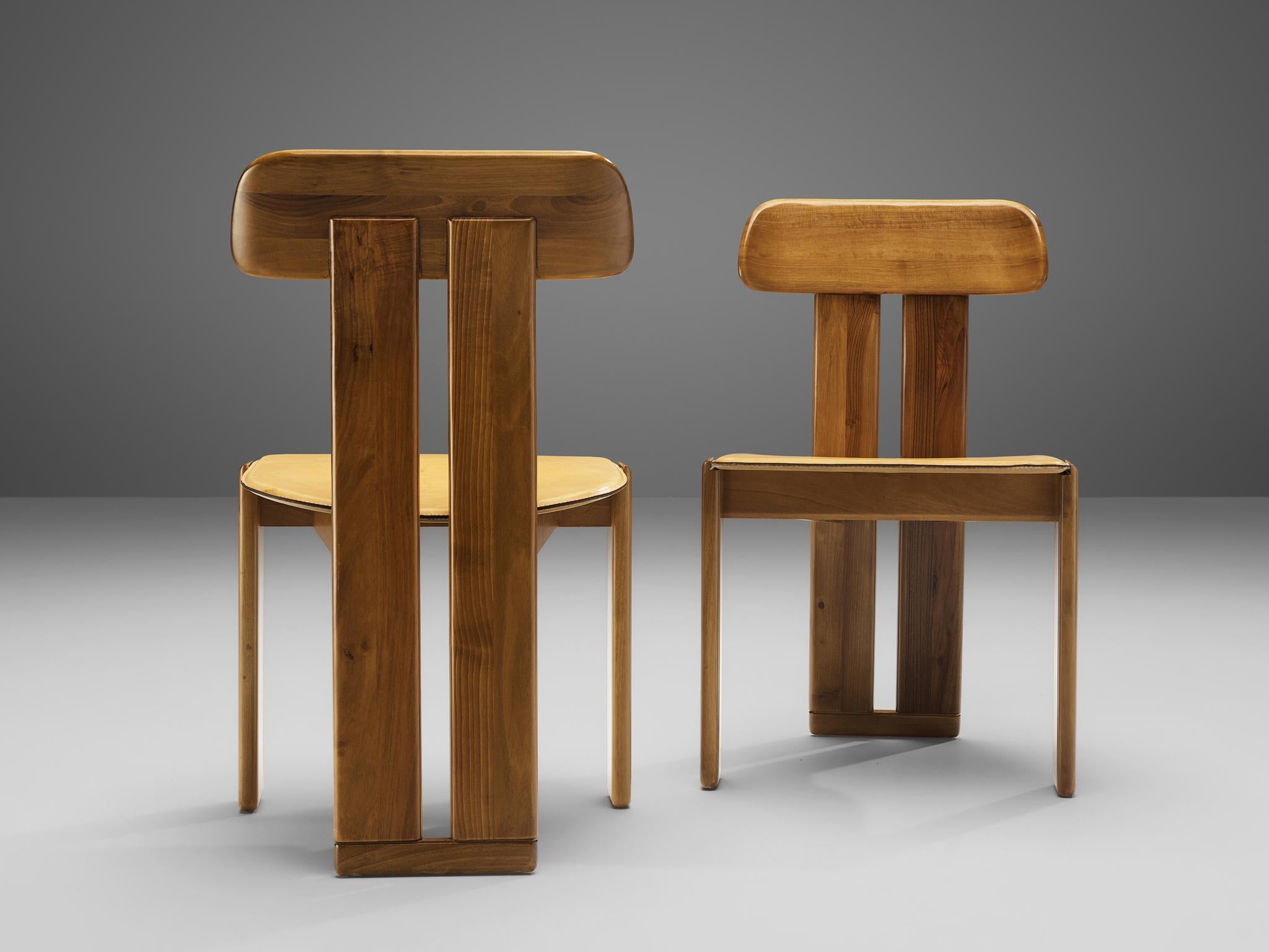 Mario Marenco for Mobil Girgi, pair of dining chairs model ‘Sapporo’, walnut, cognac leather, Italy, 1970s

These chairs feature wonderful backrests, consisting of two vertical slats distanced from each other. At the bottom and top these are