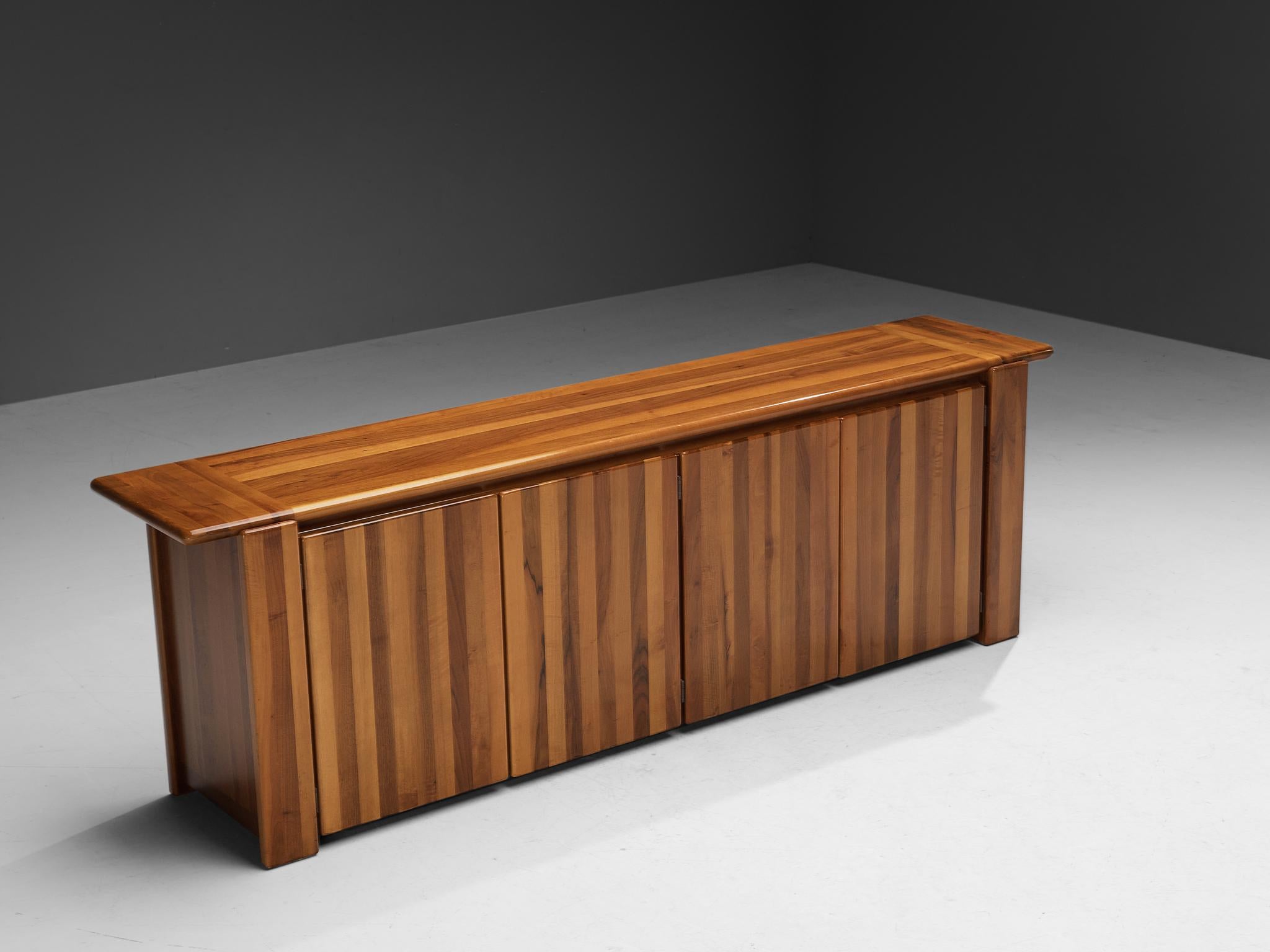 Mario Marenco for Mobil Girgi, sideboard model 'Sapporo', walnut, Italy, 1970s

An exceptional credenza by the Italian designer and actor Mario Marenco (1933-2019), featuring a high-level of craftsmanship in woodwork. The whole construction is