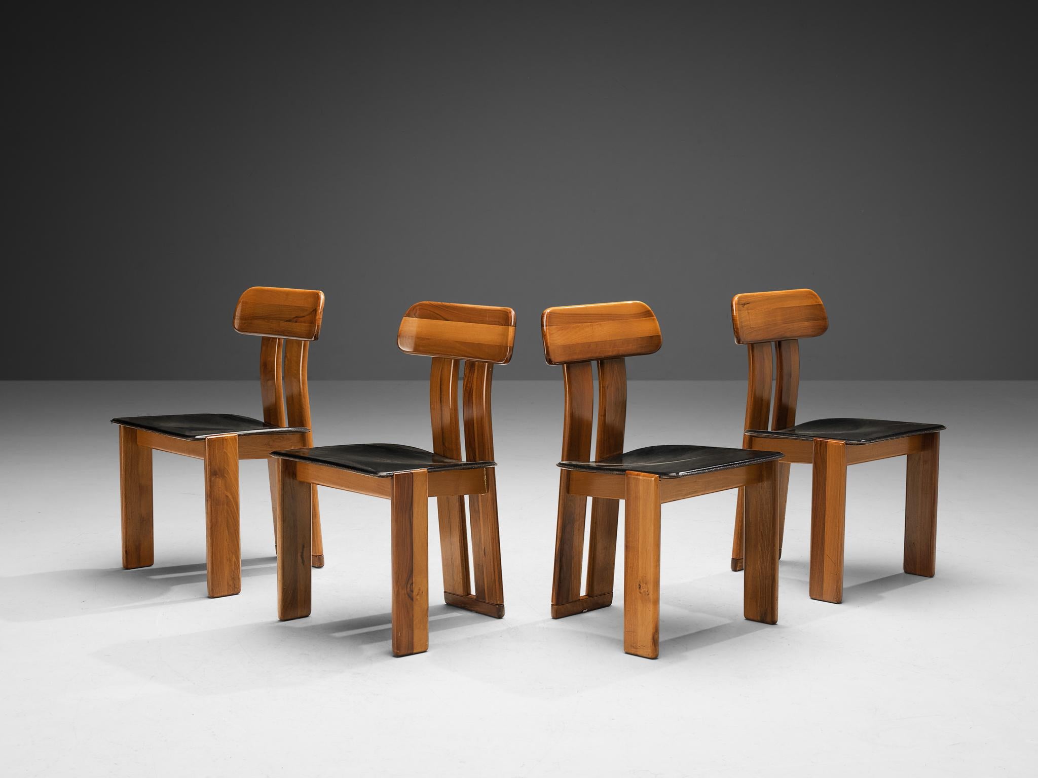 Mario Marenco for Mobil Girgi, set of four dining chairs model ‘Sapporo’, walnut, black leather, Italy, 1970s

These chairs feature wonderful backrests, consisting of two vertical slats distanced from each other. At the bottom and top these are